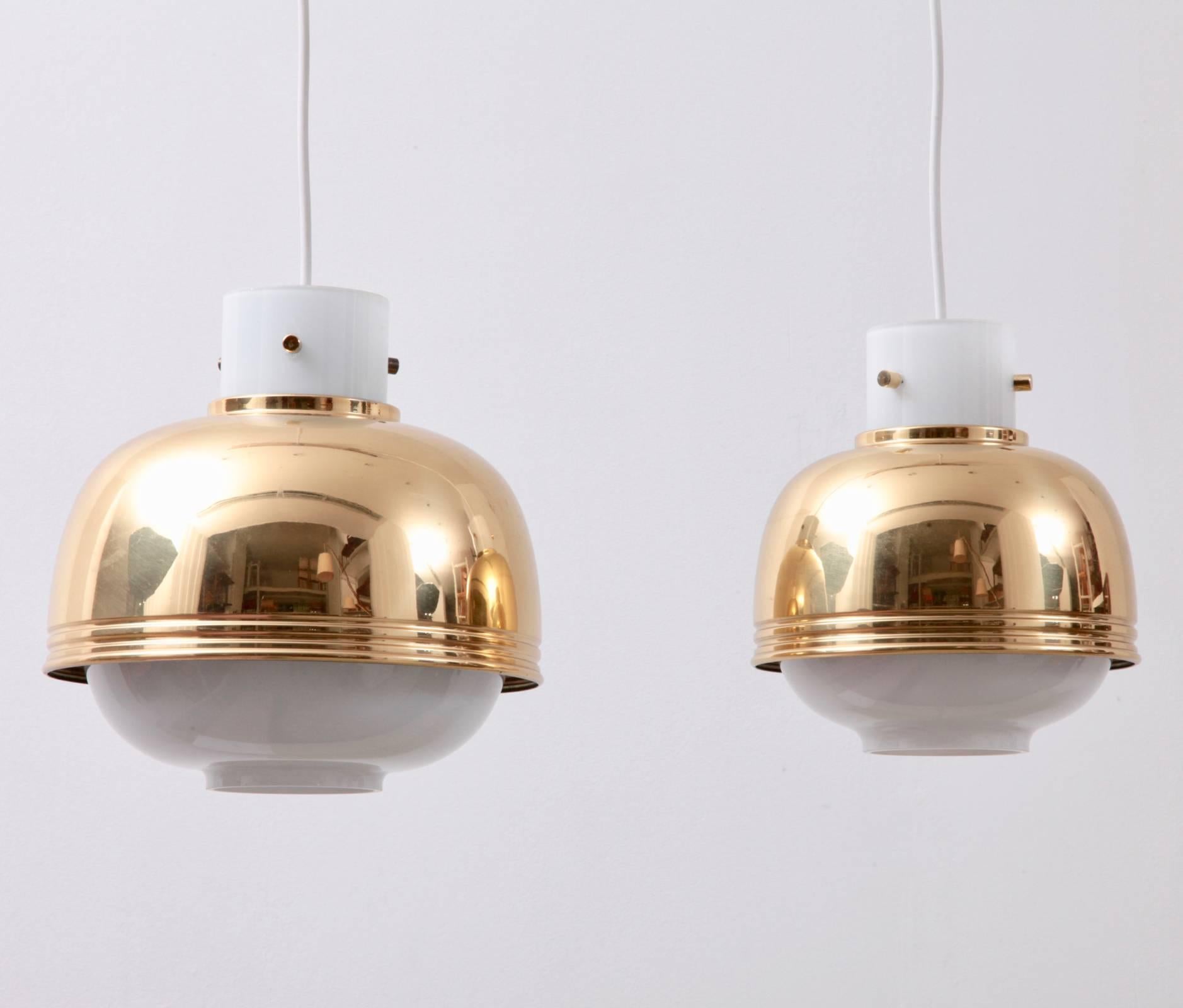 Mid-Century Modern Pair of Brass and Glass Pendant Lamp by Glashütte Limburg
