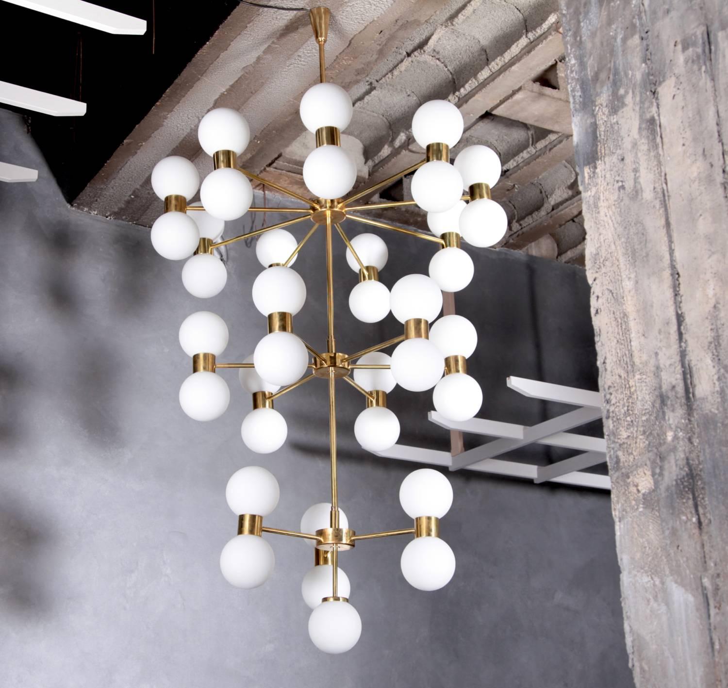 Exceptional huge frosted glass and brass chandelier. The chandelier has a very impressing size and is a real eye catcher in every room. 37 x E14 fitting. Please consider the production lead time of 5-6 weeks. 

To be on the the safe side, the lamp