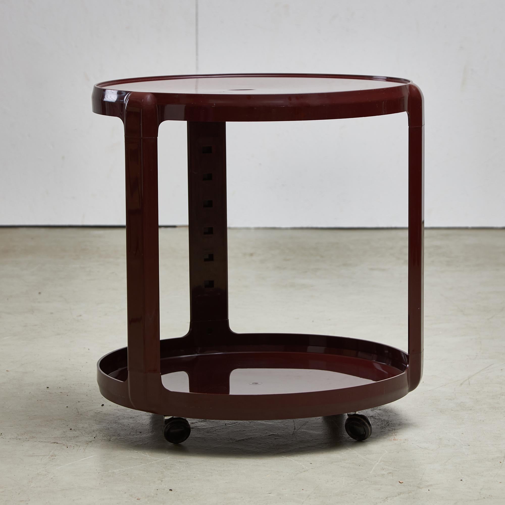 Designed by Alberto Rosselli for Kartell in the 1970s, this circular bar and serving cart captures the playful spirit and material innovation of Italian design during that era. Known for his forward-thinking work in industrial design and