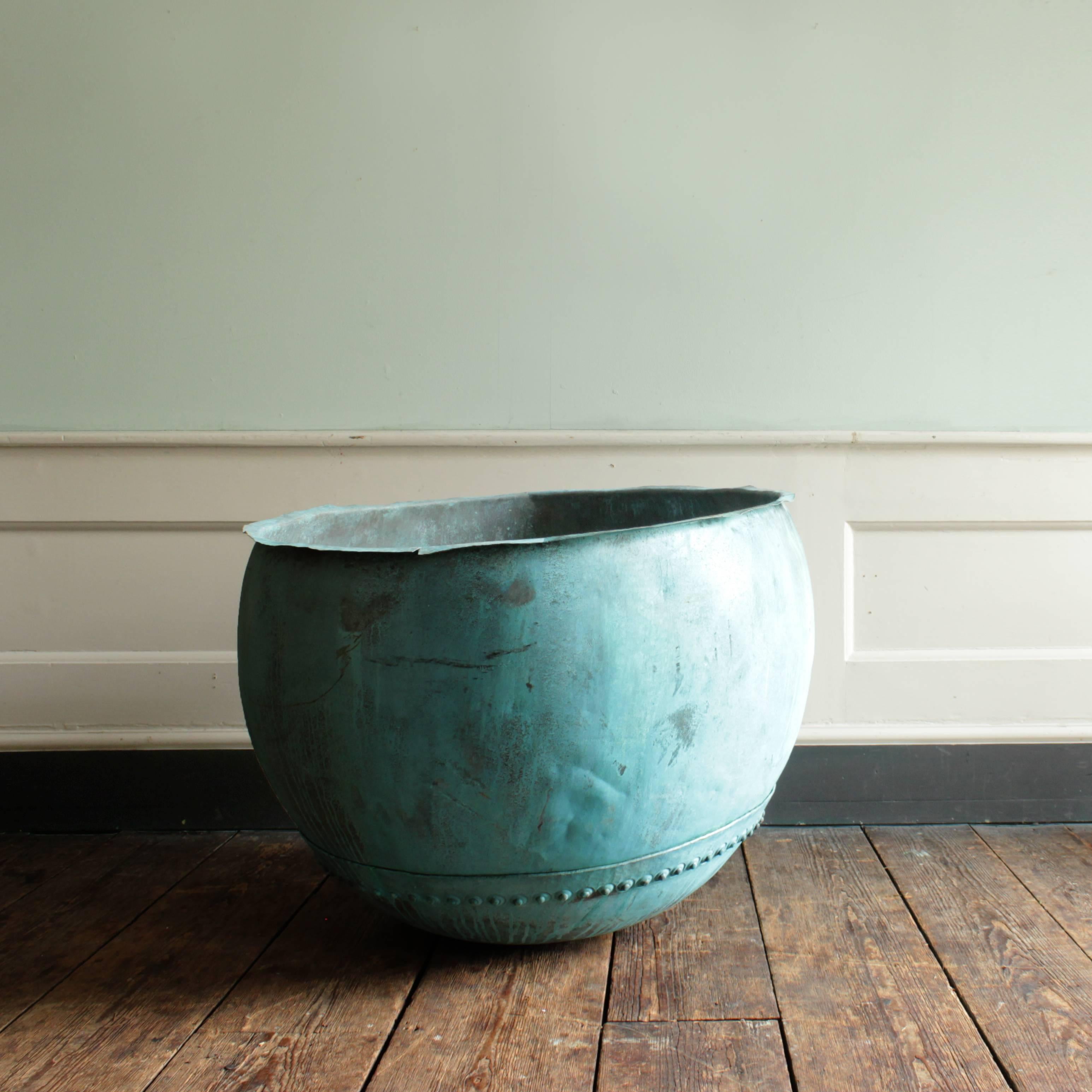 19th century copper vat, of unusual bulbous design with well patinated verdigris exterior.

Available to view at Brunswick House, London.

Dimensions: 70cm (27½