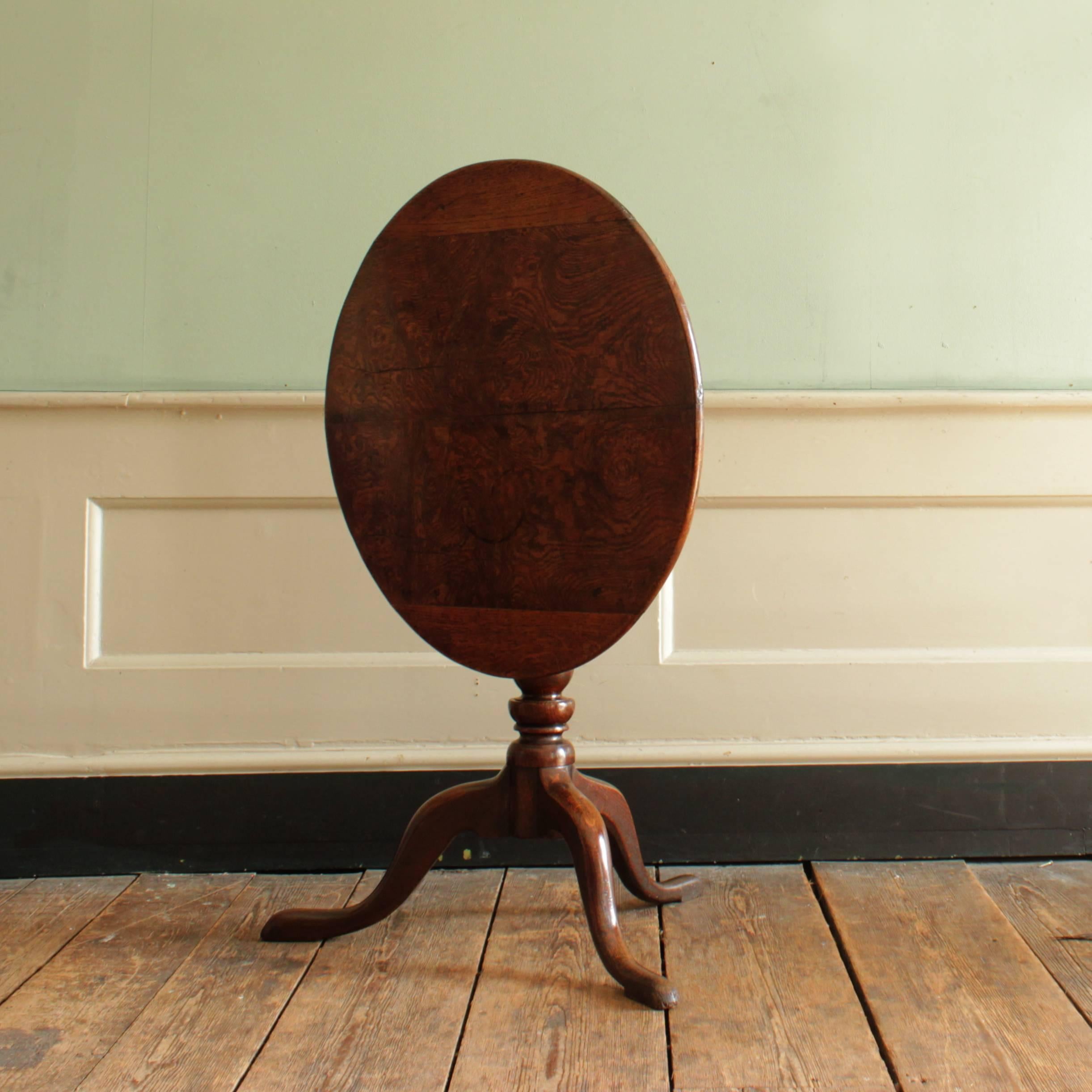 A George III oak and burr oak tripod table, with well figured top on a baluster stem, circa 1770.

Available to view at Brunswick House, London.

Dimensions: 70cm (27½