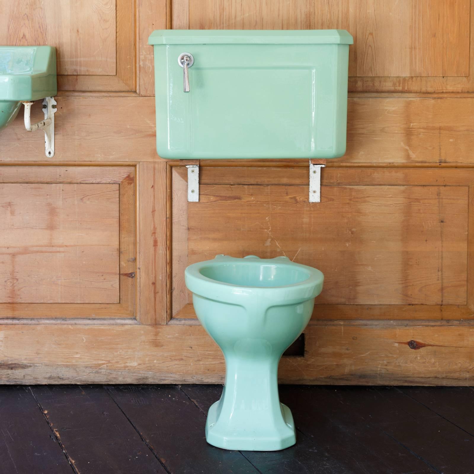 'Latona' Avocado bathroom suite by Alfred Johnson & Son Ltd. A three-piece avocado bathroom suite with original brackets that are not depicted.
