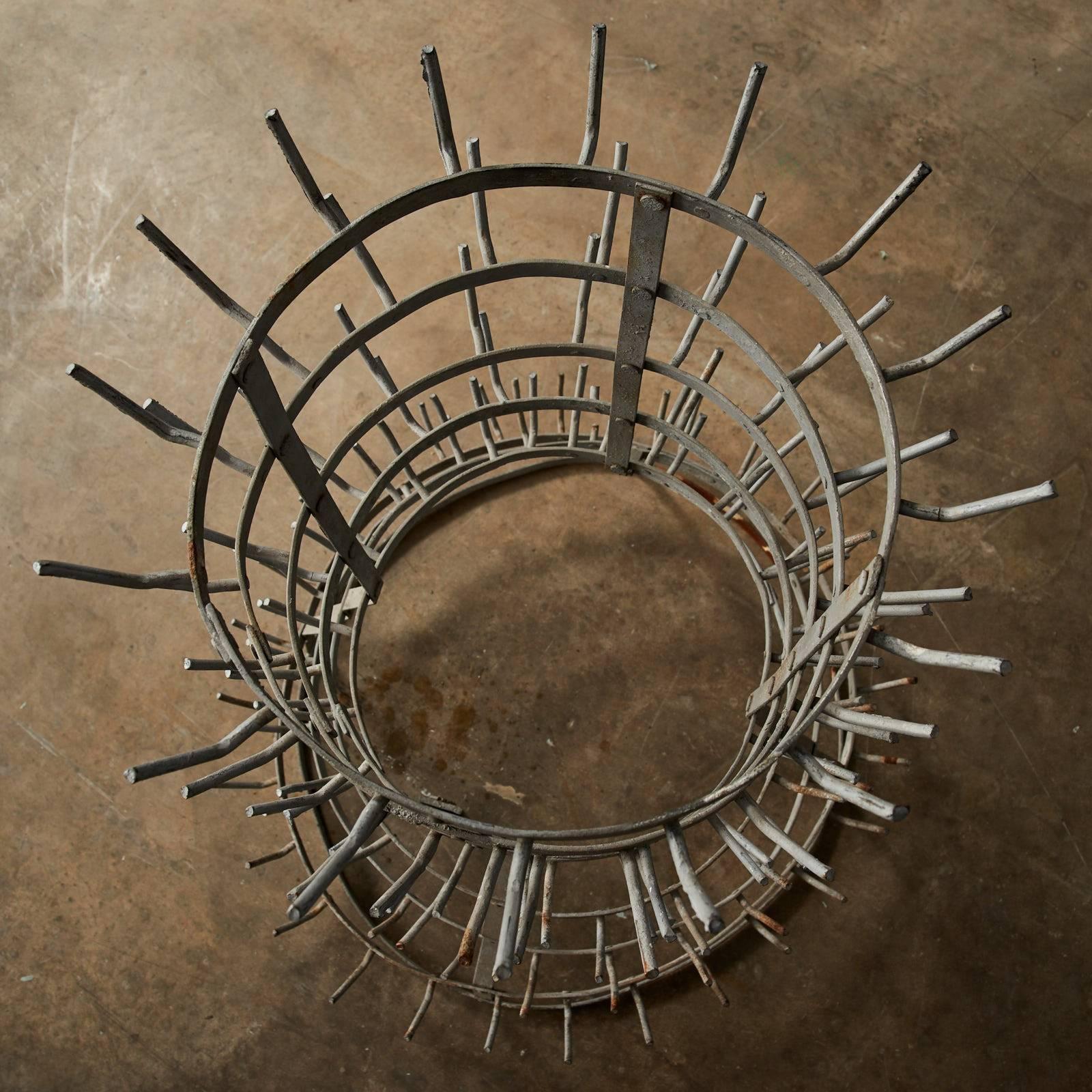 A steel wine bottle drying rack of French origin, circa 1930s.