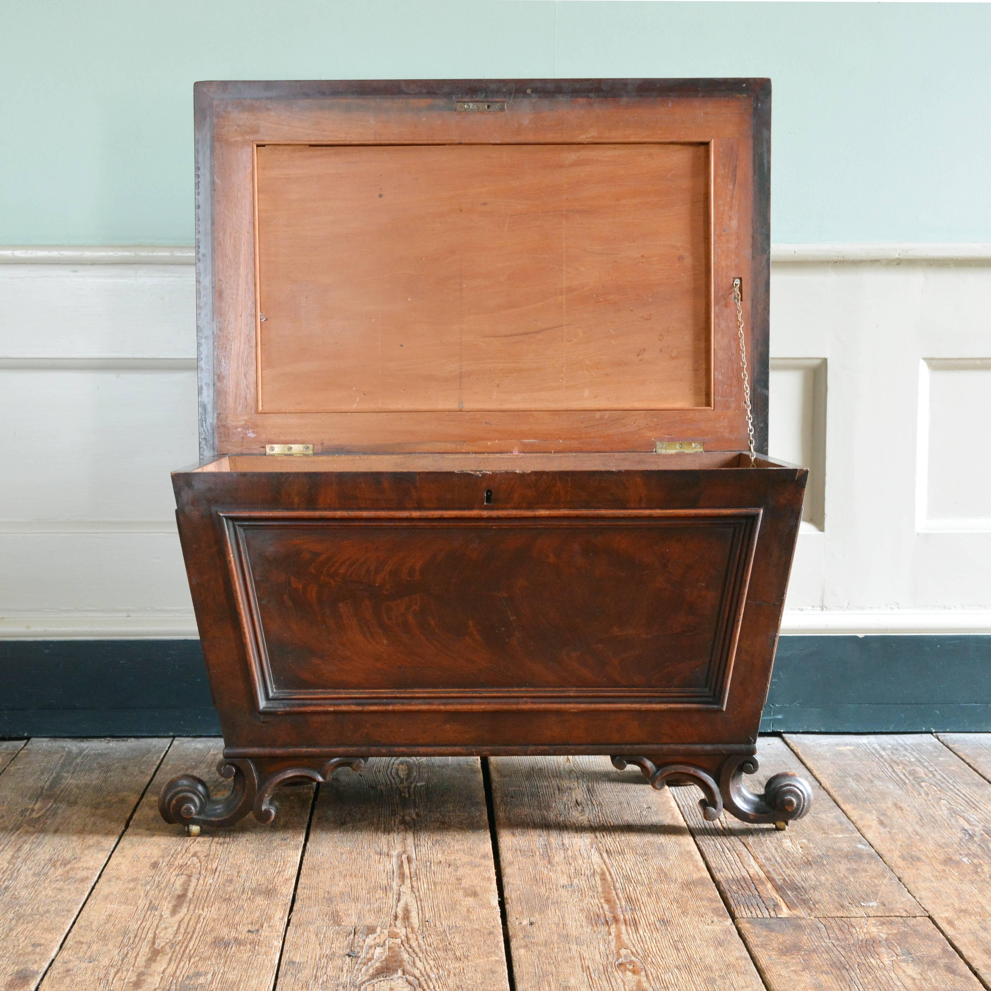 A George IV mahogany sarcophagus cellarette, the hinged lid enclosing fitted interior, stamped '10118'.

Available to view at Brunswick House, London.

Measures: Width 86cm, height 60cm, depth 58cm.