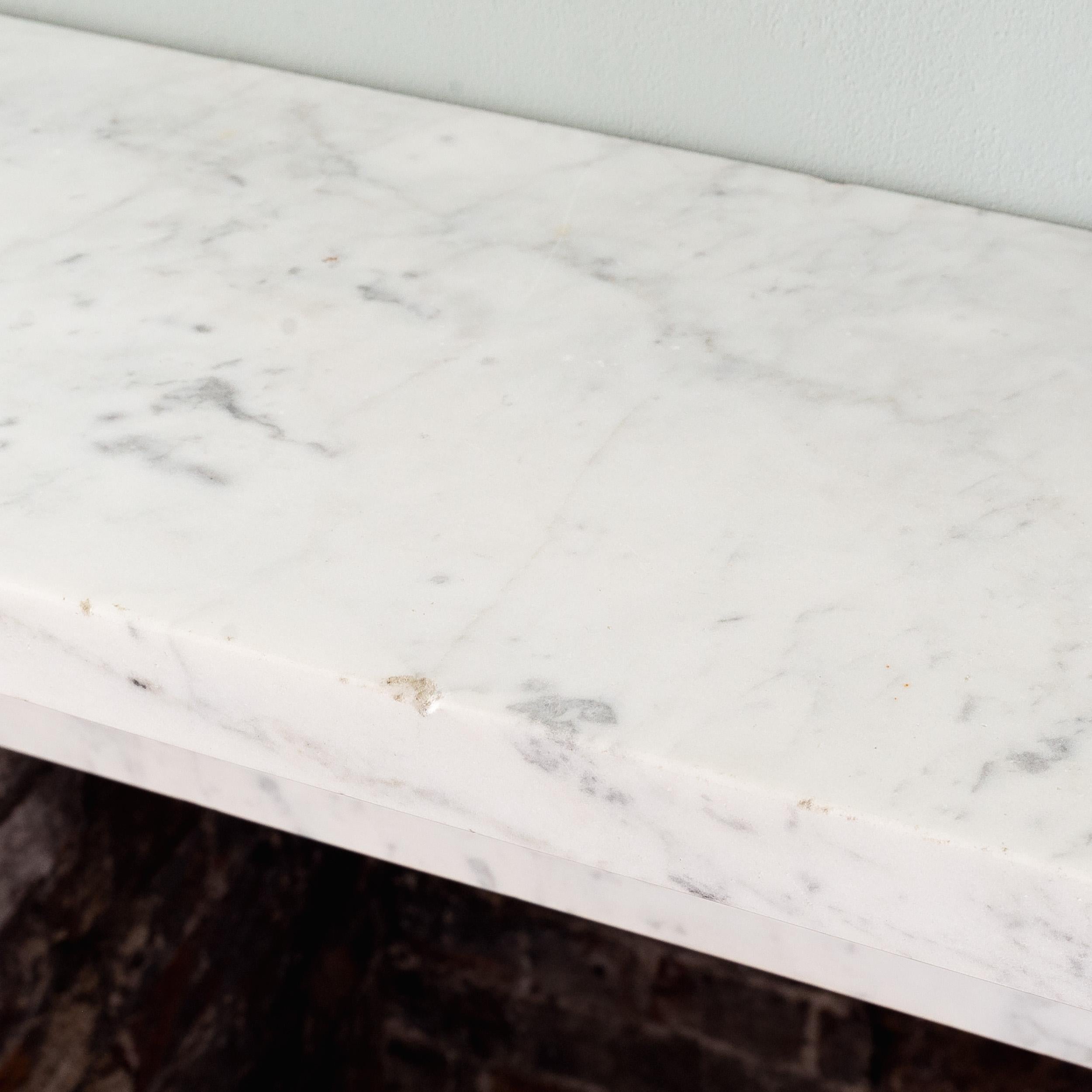 19th Century Nineteenth Century Regency Carrara Marble Bullseye Fireplace For Sale