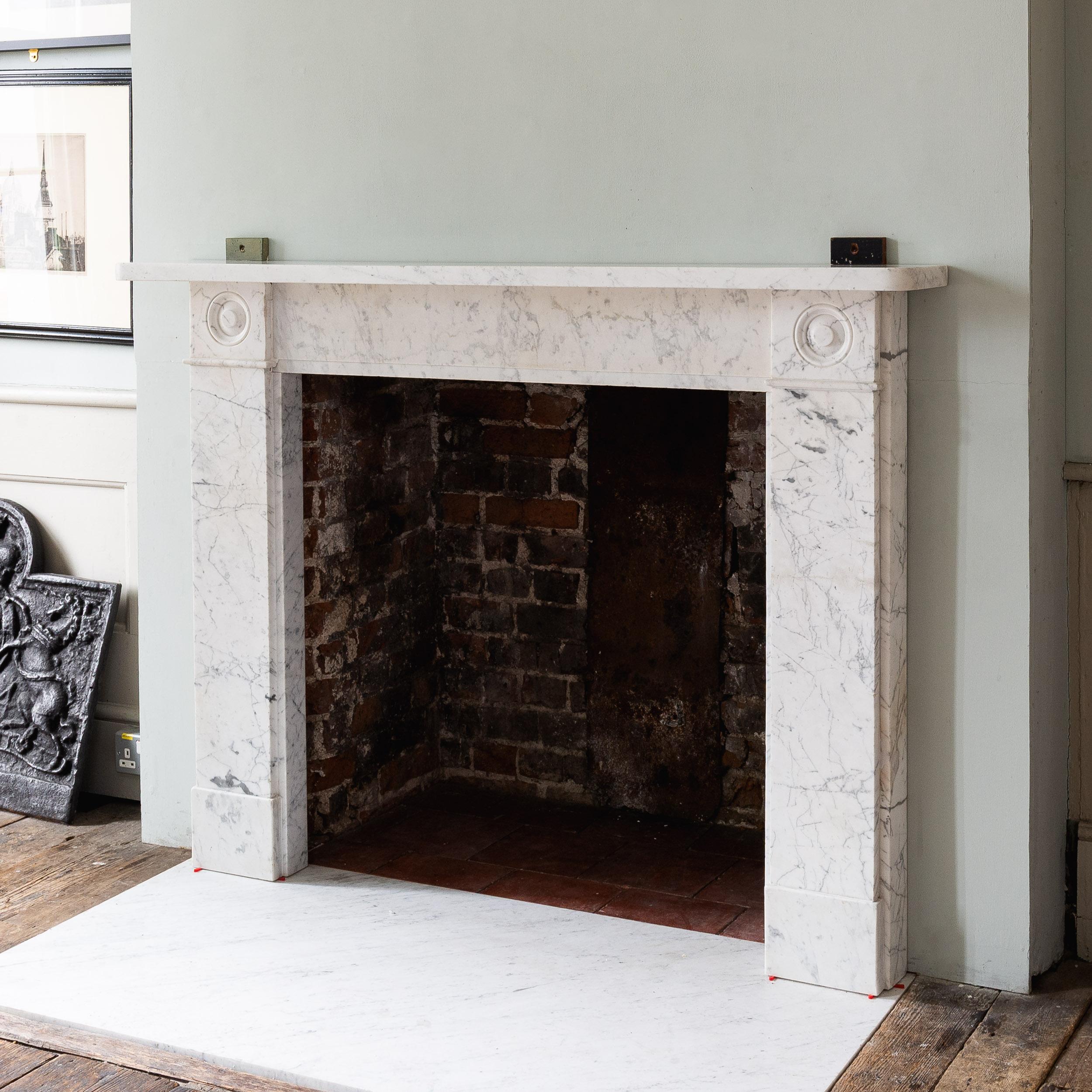 Nineteenth Century Regency Carrara Marble Bullseye Fireplace For Sale 1