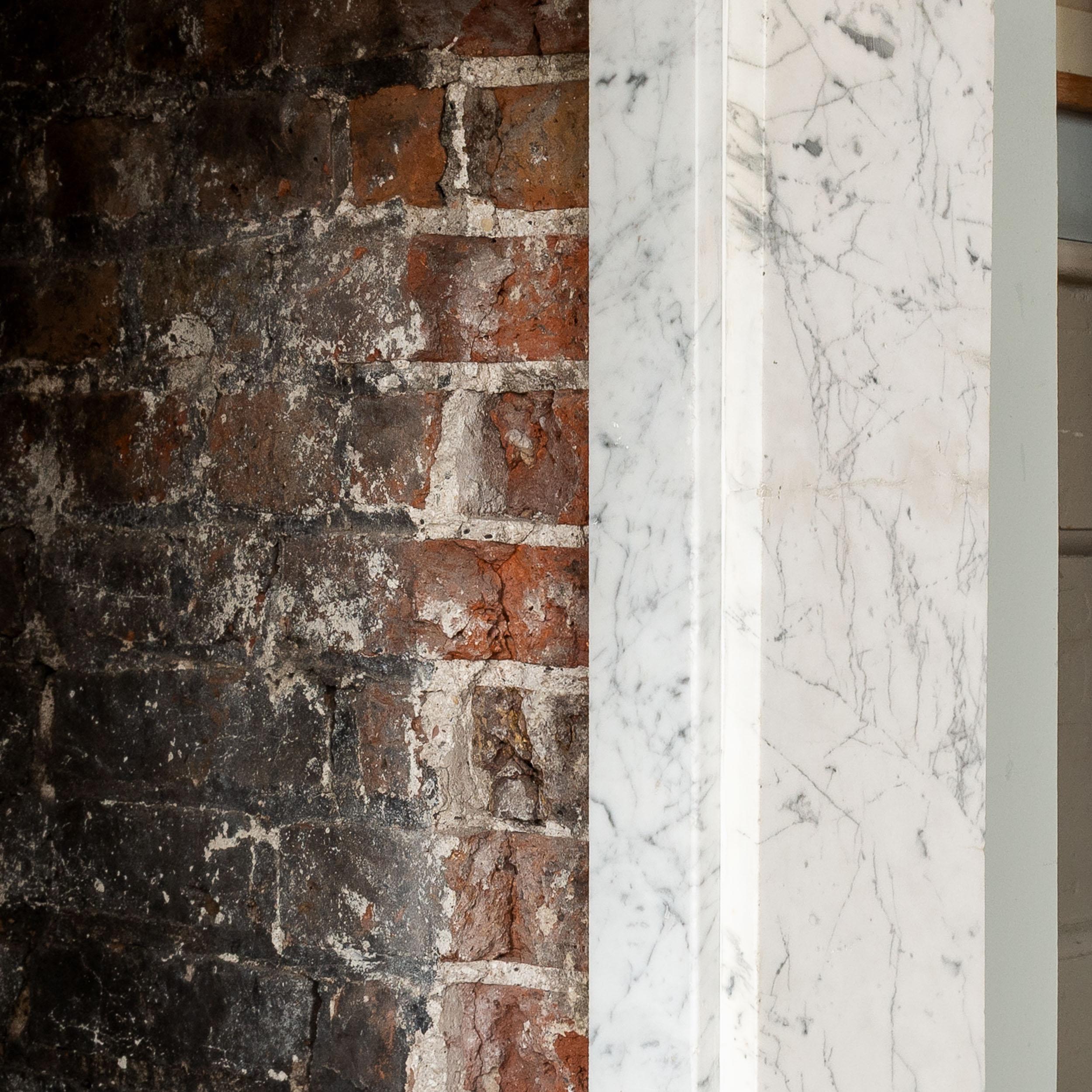 Nineteenth Century Regency Carrara Marble Bullseye Fireplace For Sale 3