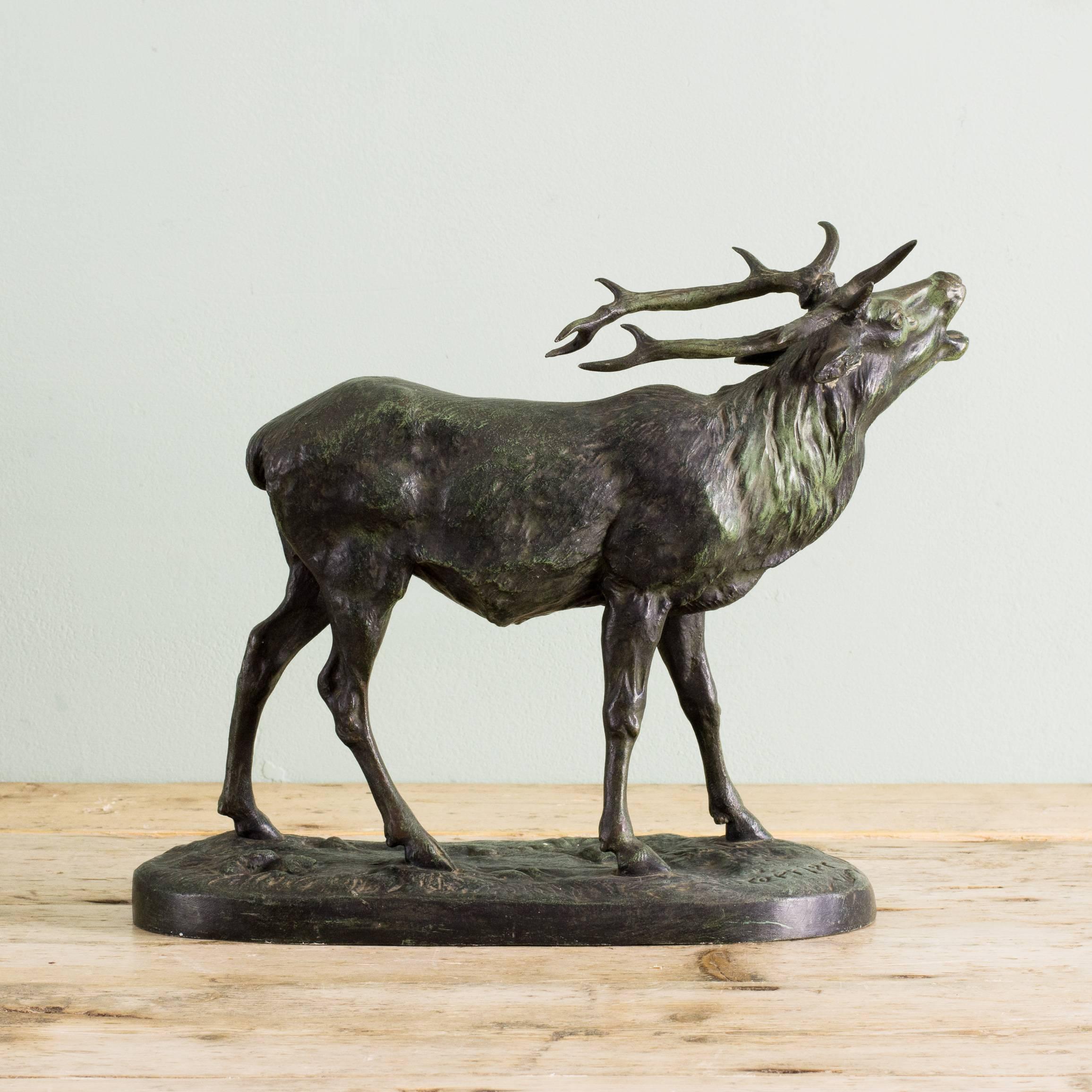 A French bronze sculpture of a stag, signed J. Terrier, after the 19th century original by Charles Valton.