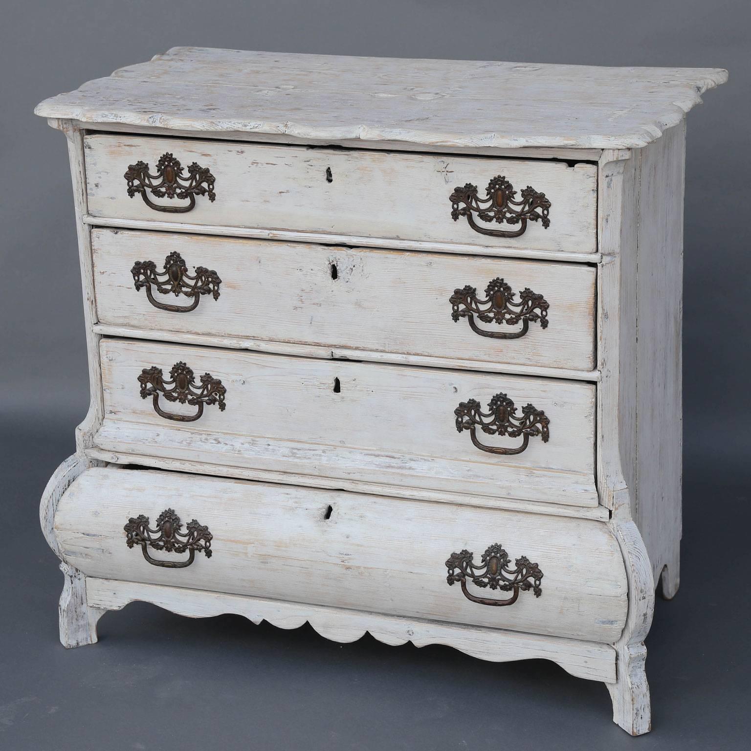 Early 19th century Bombé style painted commode with four drawers and brass hardware.