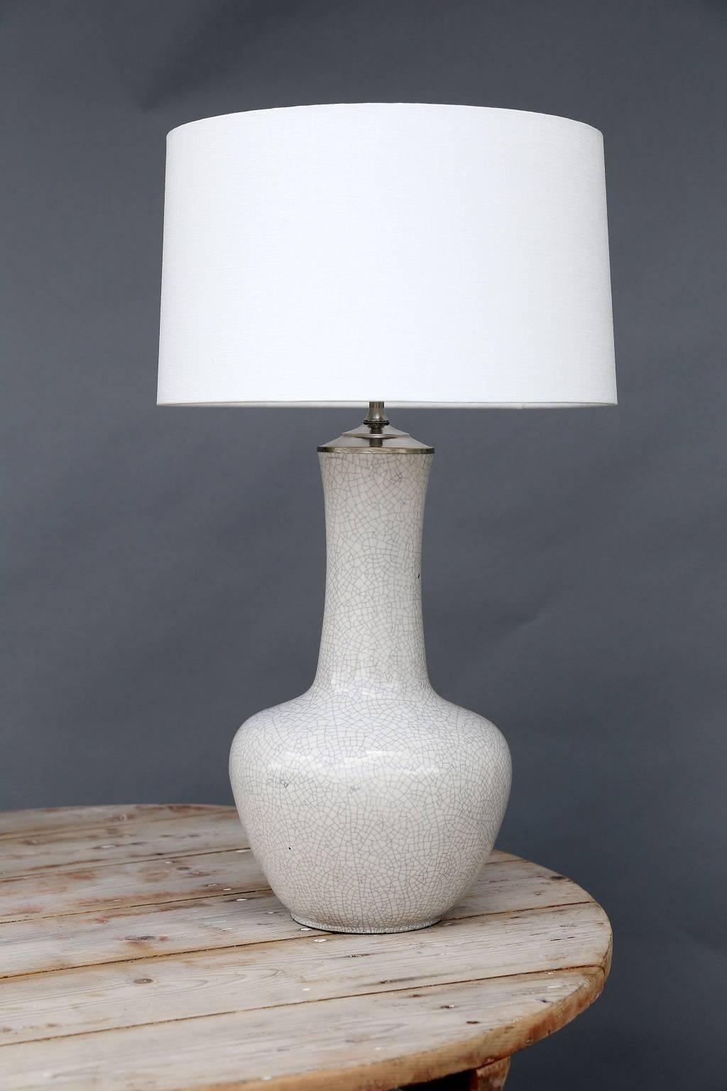 Vintage crackle glaze white vase, newly wired as custom table lamp with rolled-edge linen shade.