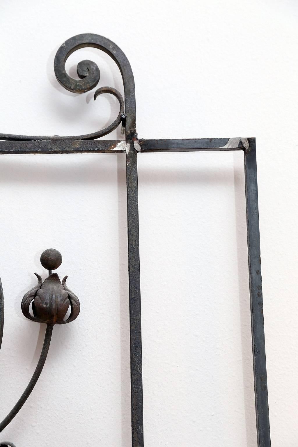 Pair of 19th Century French Forged Iron Gates, later adapted as a Headboard In Excellent Condition In Houston, TX