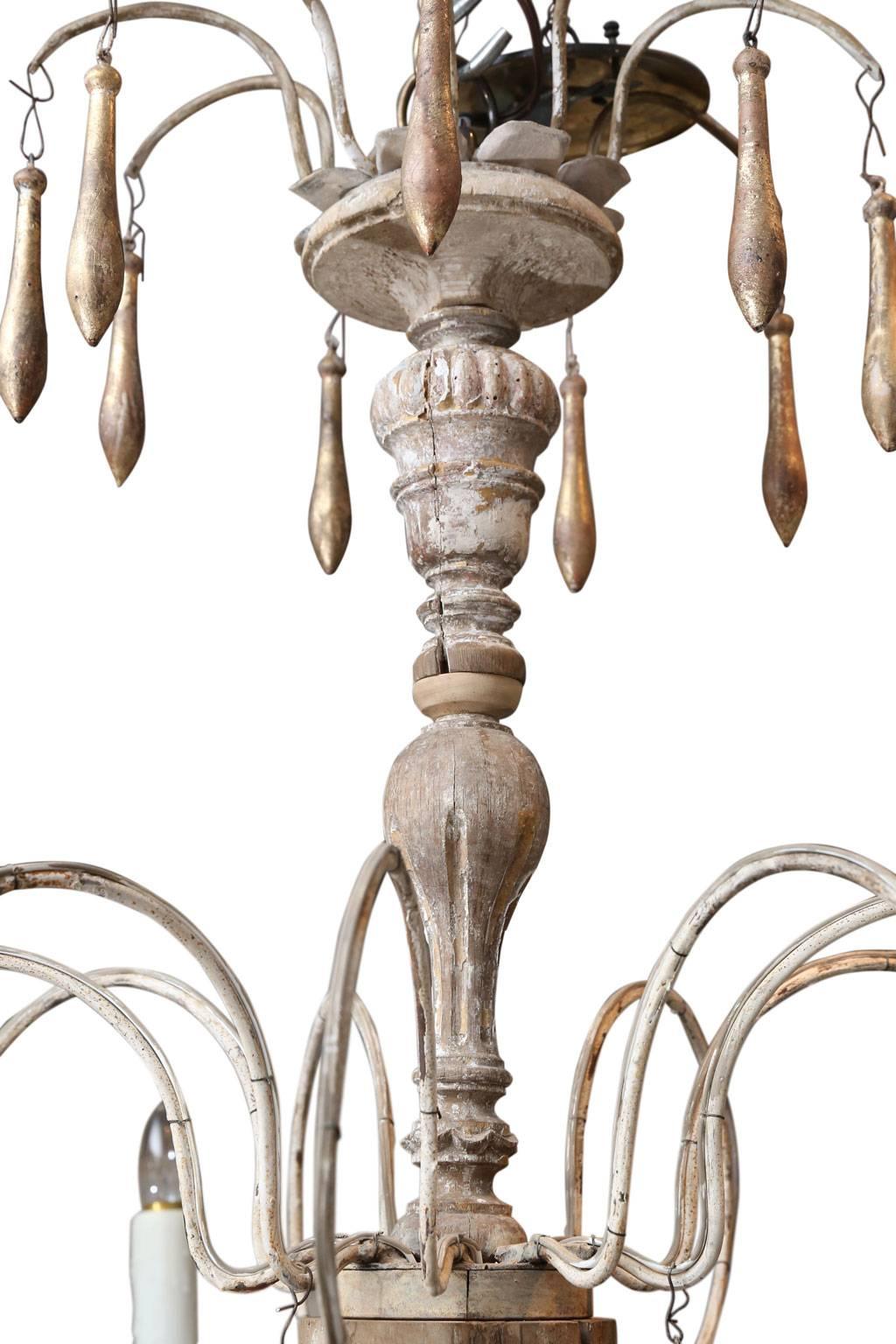 Carved Eight-Arm Wood and Iron Chandelier from France