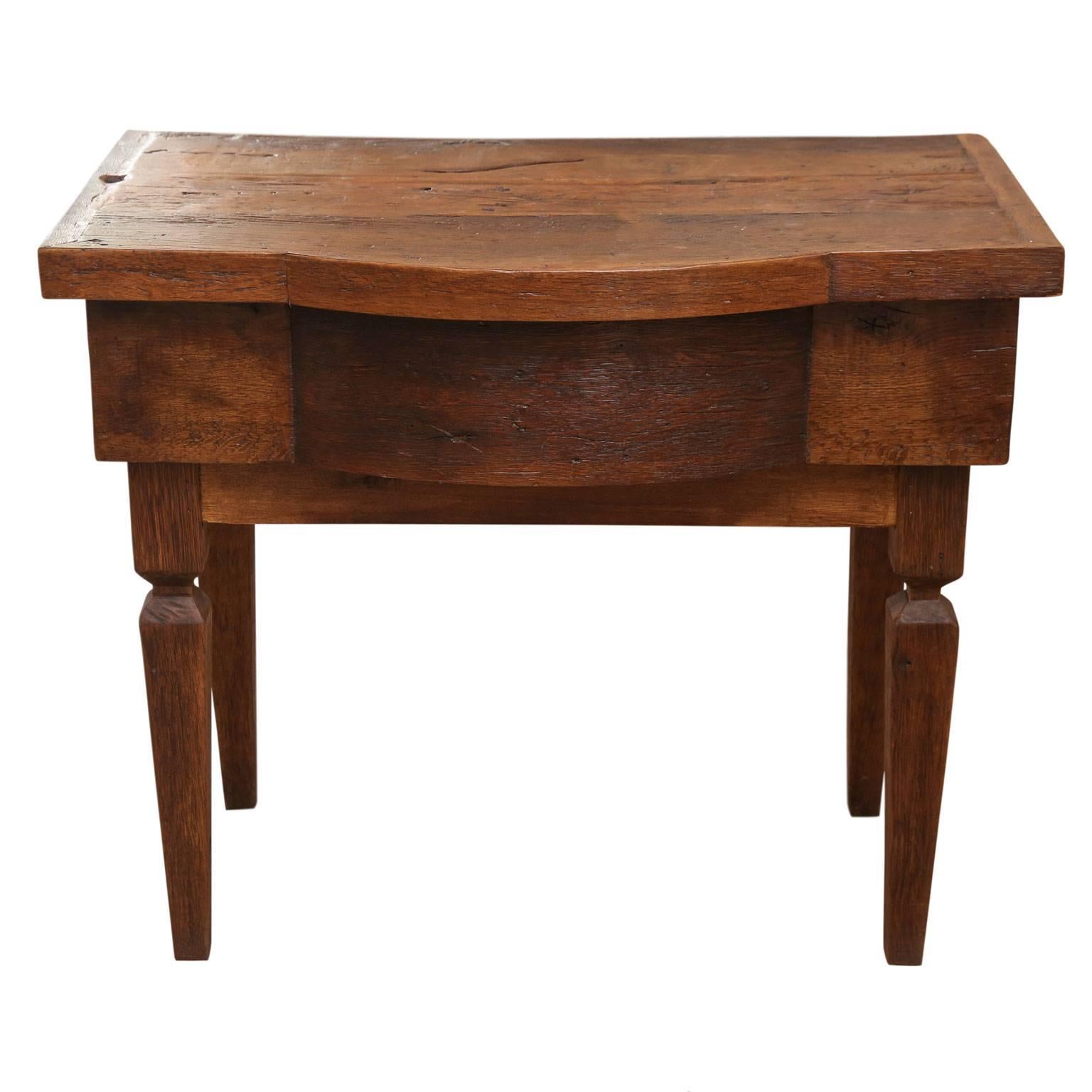French walnut vanity table newly constructed from antique wood. Bow-front shape upper portion, raised on squared tapered legs, with hollow space (to conceal plumbing). Hollow interior space lined with a protective layer of plywood.