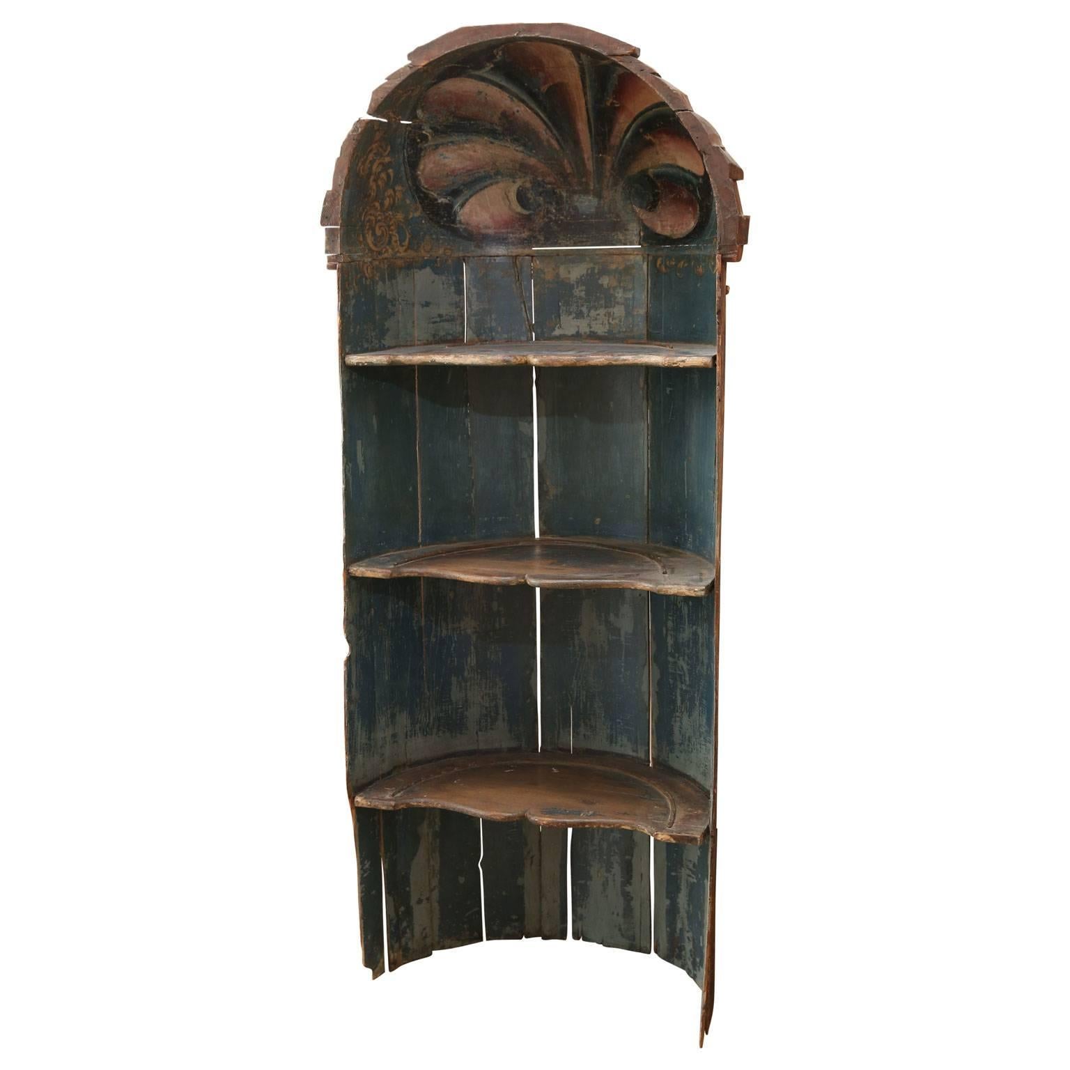 Baroque period niche (bowfat) painted in dark blue with secondary colors of gold, violet and pink. Dates early to mid-18th century and features built-in open cupboard (bowfat). Dutch or French in origin with a marvelous sculptural quality. Interior