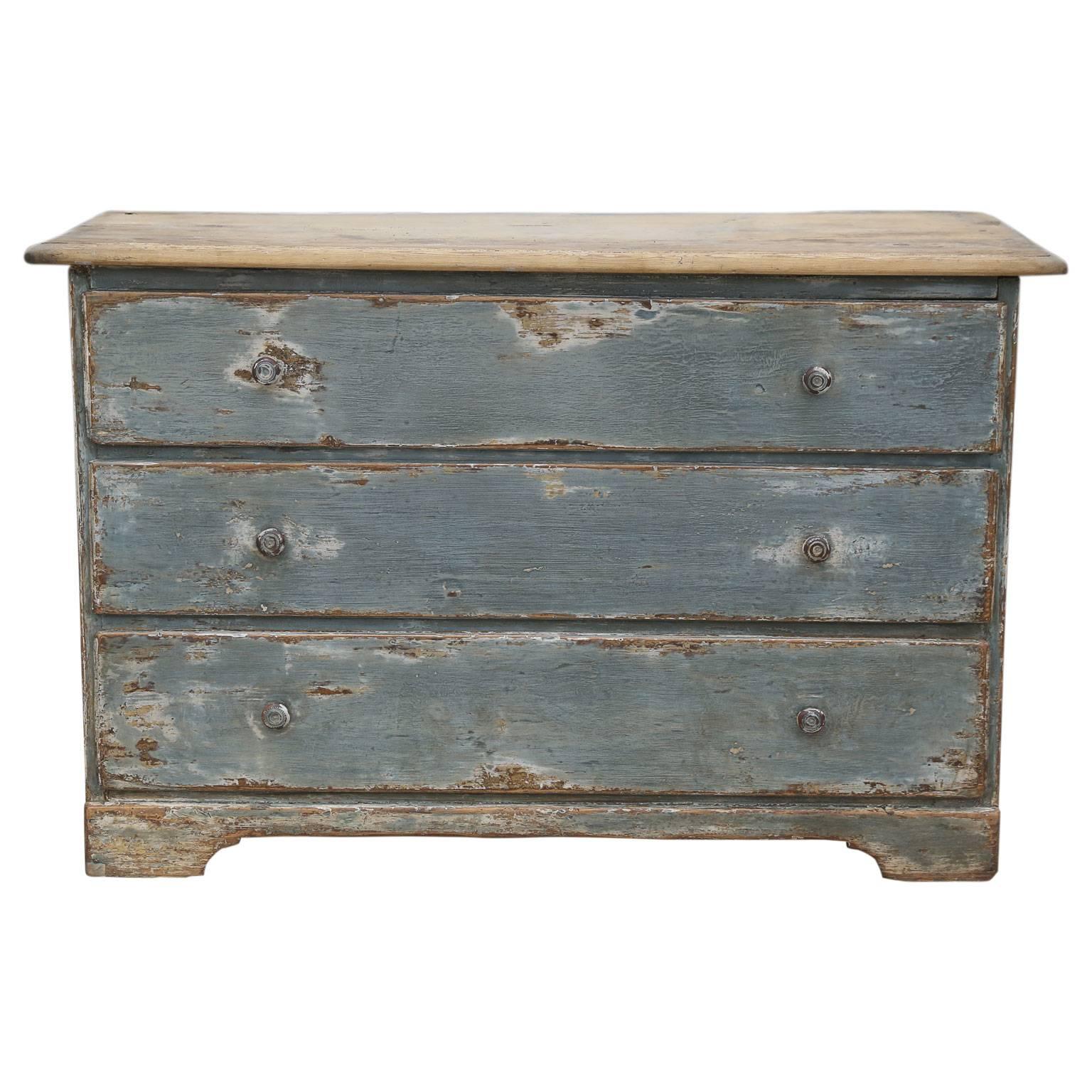 Blue painted commode: 19th century Swedish three-drawer commode with scrubbed top.