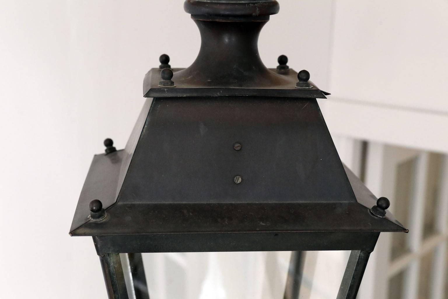 Pair of iron and copper lanterns (originally gas lanterns), can be wired for electricity, circa 1900, France. Each lantern sold individually at $3,800.