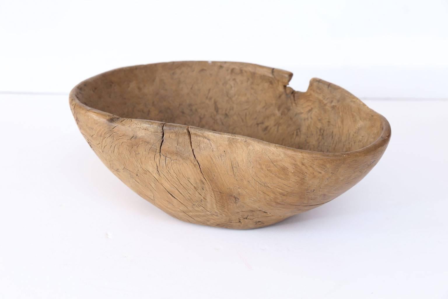 Set of three decorative 19th century root wood bowls (top to bottom):

Measures: Large hand-carved burled oval shape root wood bowl with exquisite patina and maker's initials, 5.5 inches high x 15.25 inches wide x 10 inches deep.
Hand-carved