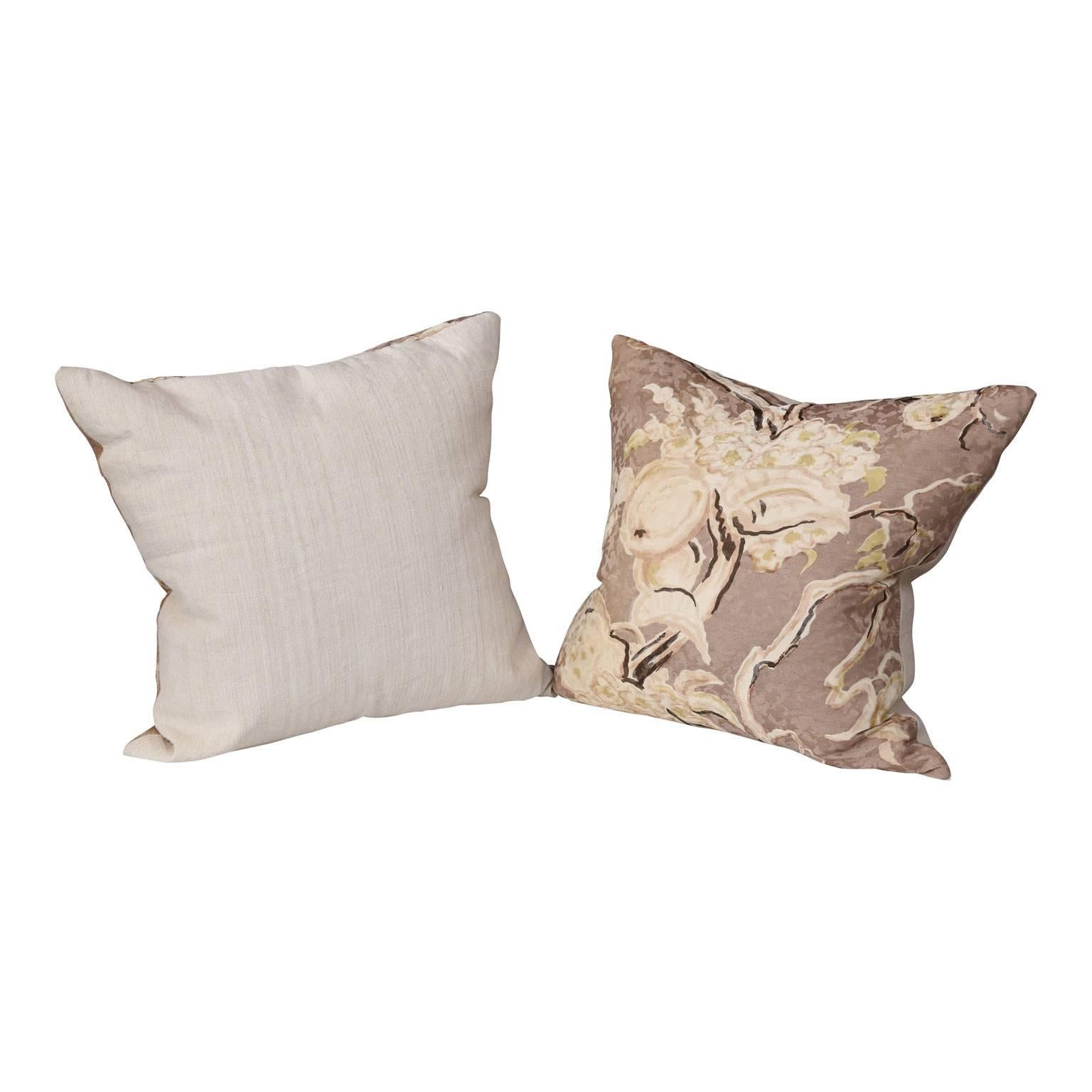 Pair of vintage silk cushions: hand-painted silk damask pillows with linen and silk blend backs (circa 1950-1970). Sides of pillows measure 22 inches when pulled taut.