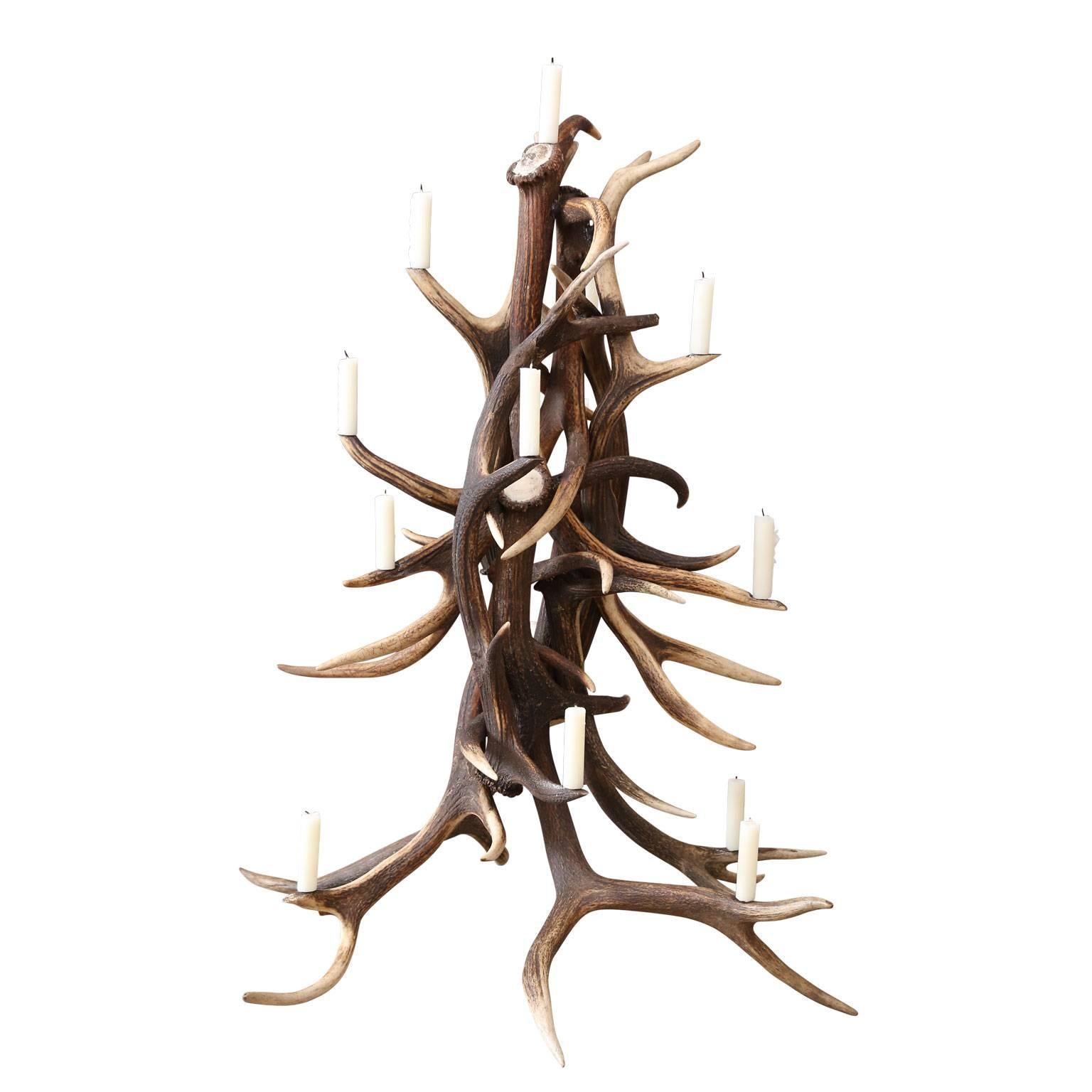 Red stag antler tree-shape candelabra. Tree has metal prickets for candles (can also be electrified). Would make an excellent pair with item (1stdibs ref: LU98479301801).
