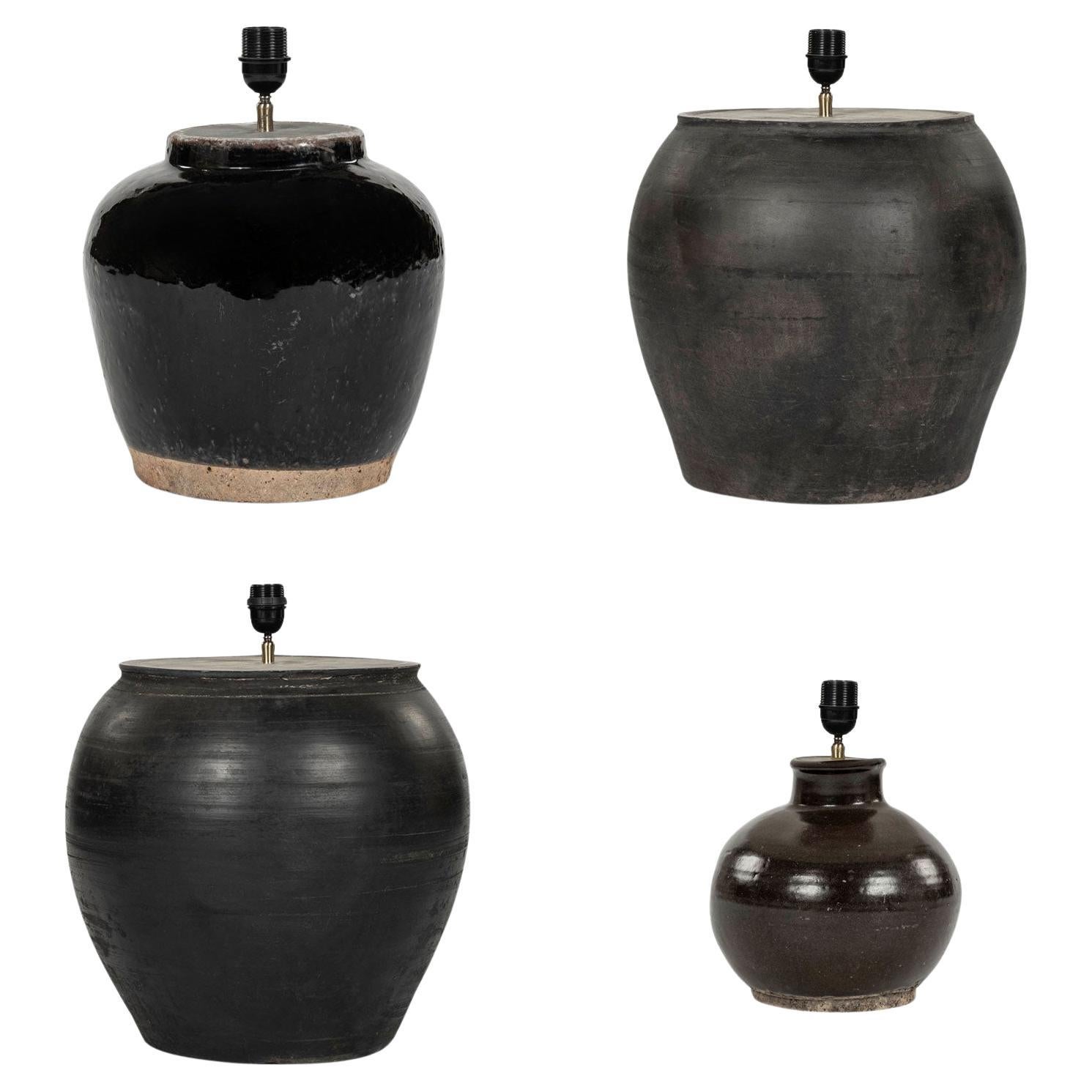 Collection of Four Pottery Lamps
