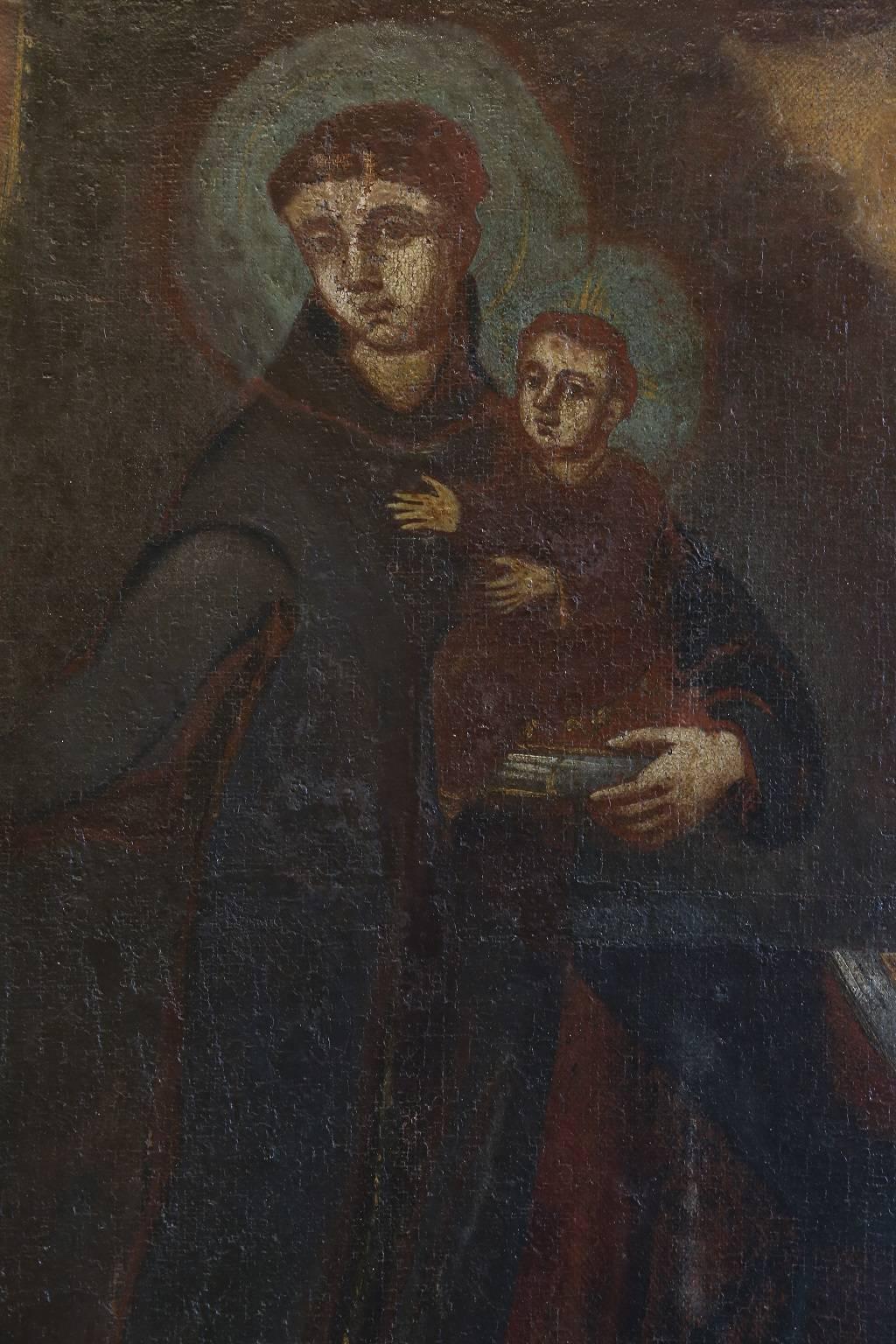 Cuzco oil of Saint Anthony (San Antonio) of Padua with the Christ Child on canvas set in a decorative gilded frame, by an unknown Cuzco School artist. Original late 18th century canvas attached to a 20th century canvas with some flaking and patches,