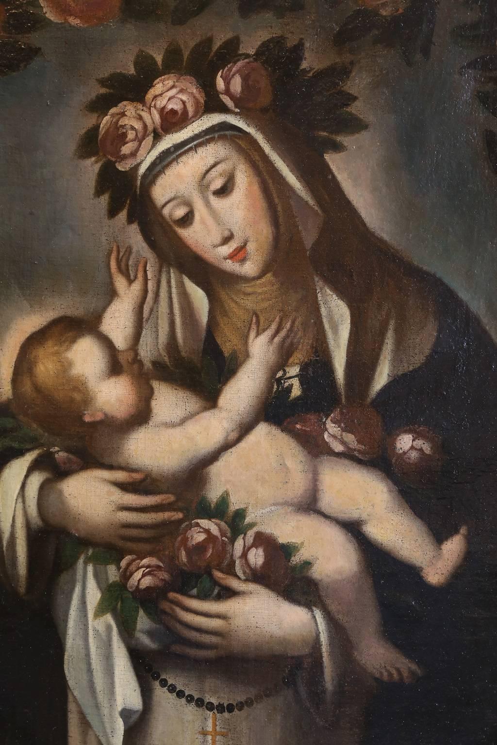 Late 18th century oil on canvas of the virgin with child, by an unknown artist in the Cuzco School style, set in a decorative giltwood frame. Restored, with some small patches. The Cuzco School (Escuela Cuzqueña) was a Roman Catholic artistic