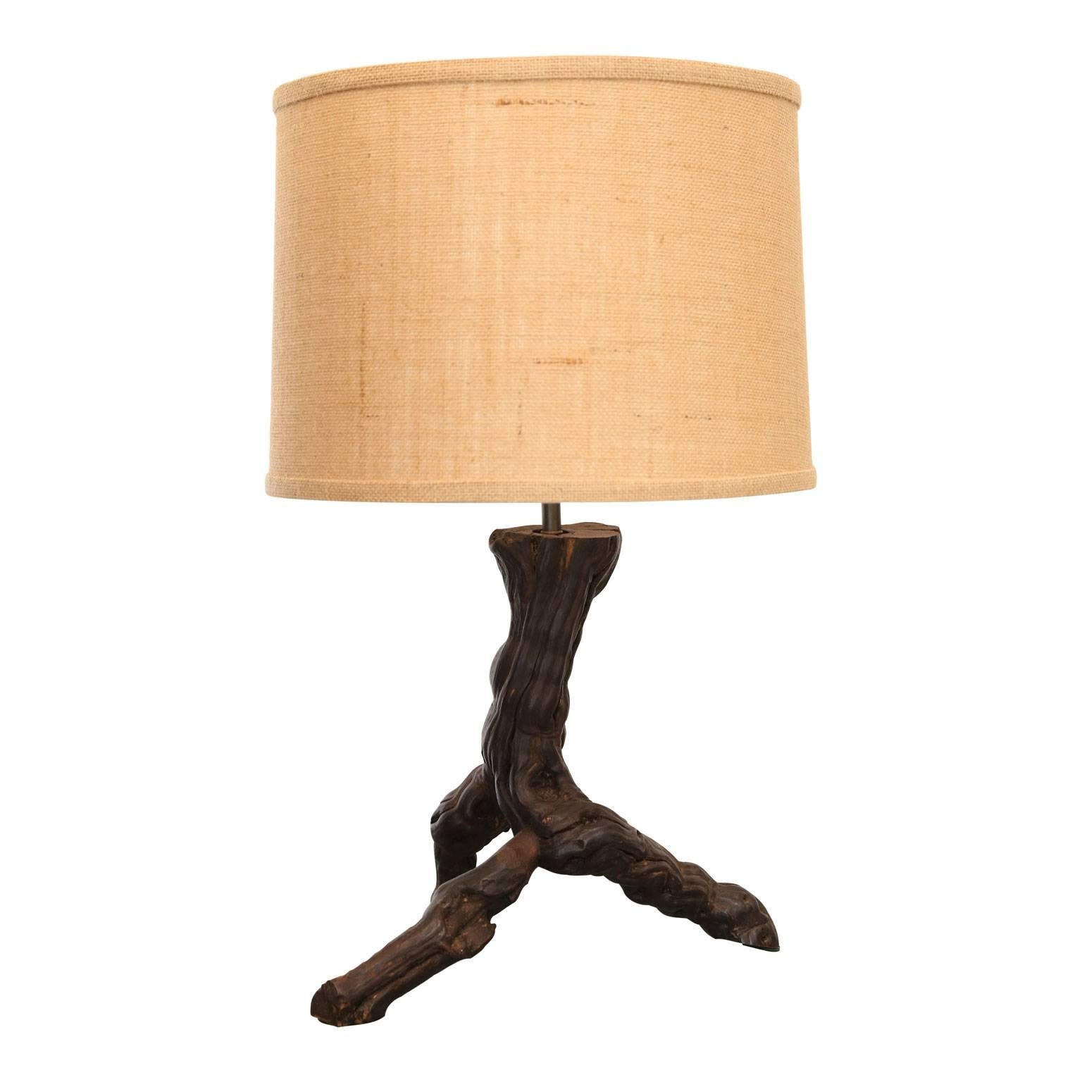 Near pair of root lamps: custom vintage French table lamps, from tree roots, newly-wired for use within the USA. Sold with new complementary burlap shades (measurements include the shades). These versatile lamps add rich color and texture to a space