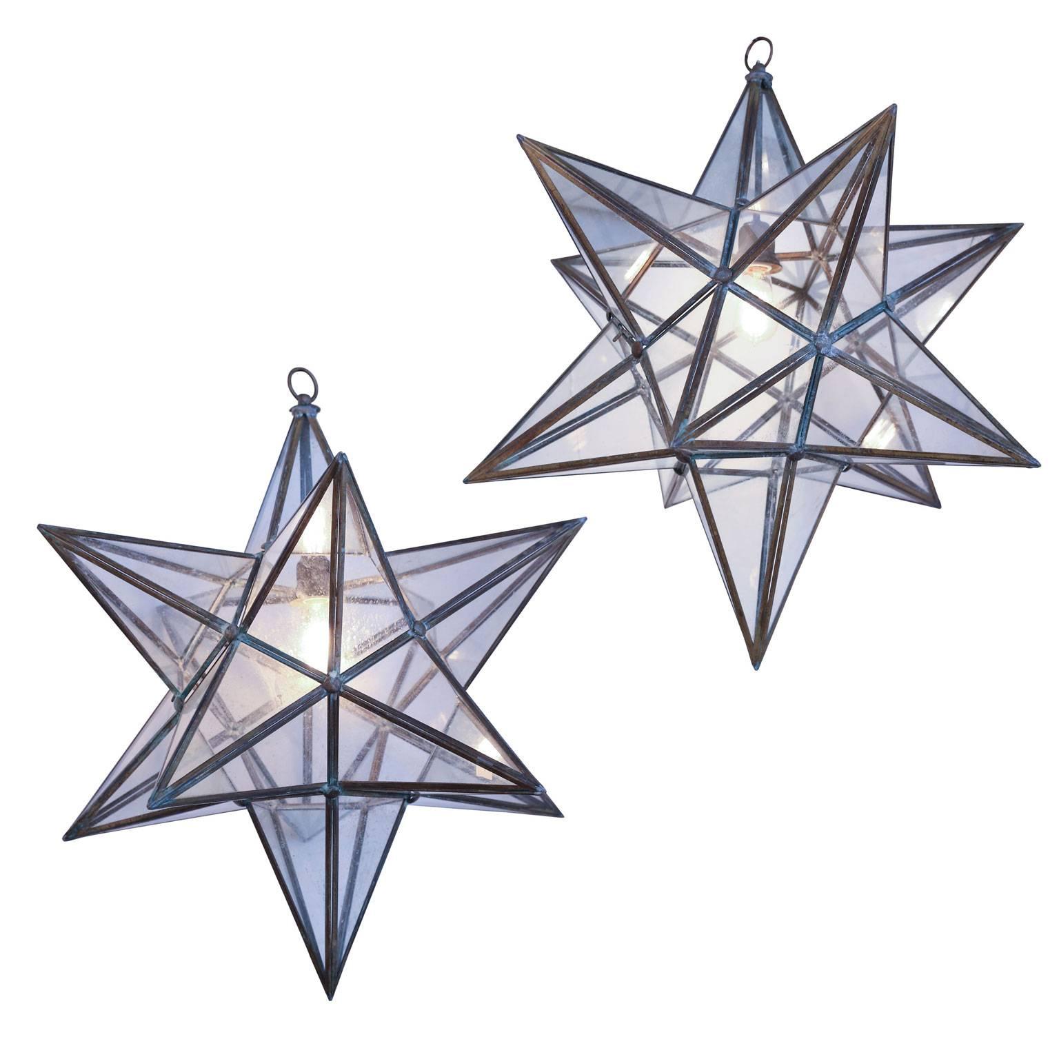 Two Voluminous Glass Star Pendants