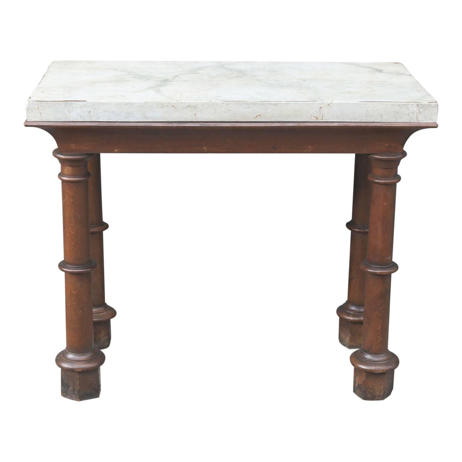 Faux Carrara marble-top oak two-sided console, an unusual and handsome 19th century console table from England, finished on all four sides (perfect to float away from a wall). A beautifully executed faux marble thick single plank top supported by a