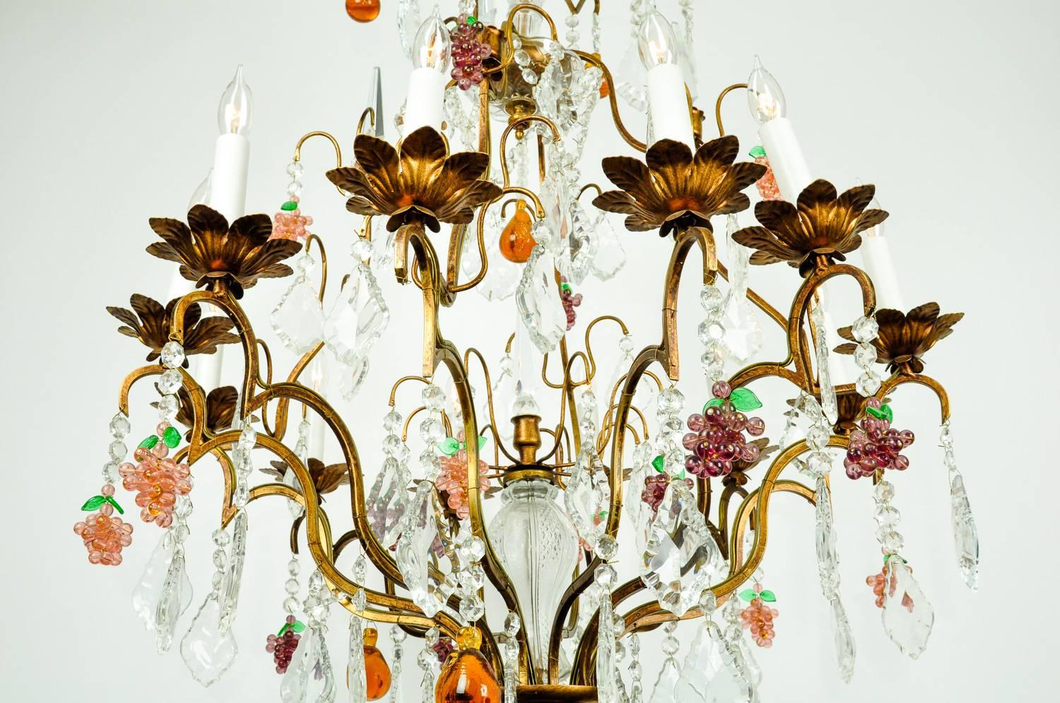 Vintage Venetian Murano crystal fruits design details chandelier with gilded brass frame. Excellent working condition. Rewired for US use. The chandelier measure 35 inches high from base to the top brass frame. 32 inches body diameter. High may be