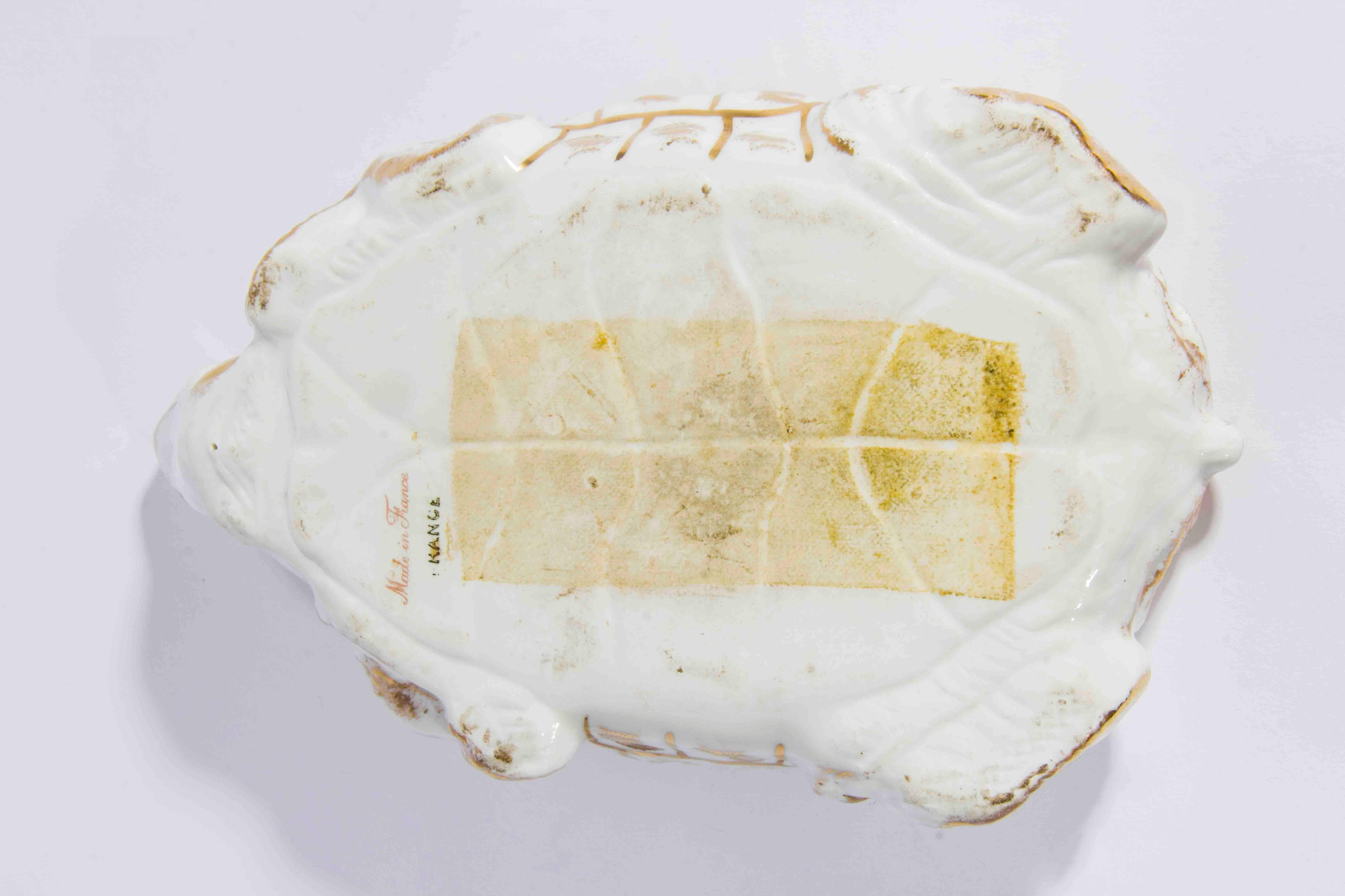 Antique Limoges porcelain turtle shaped box with gold painted detail in excellent condition. Measures 9