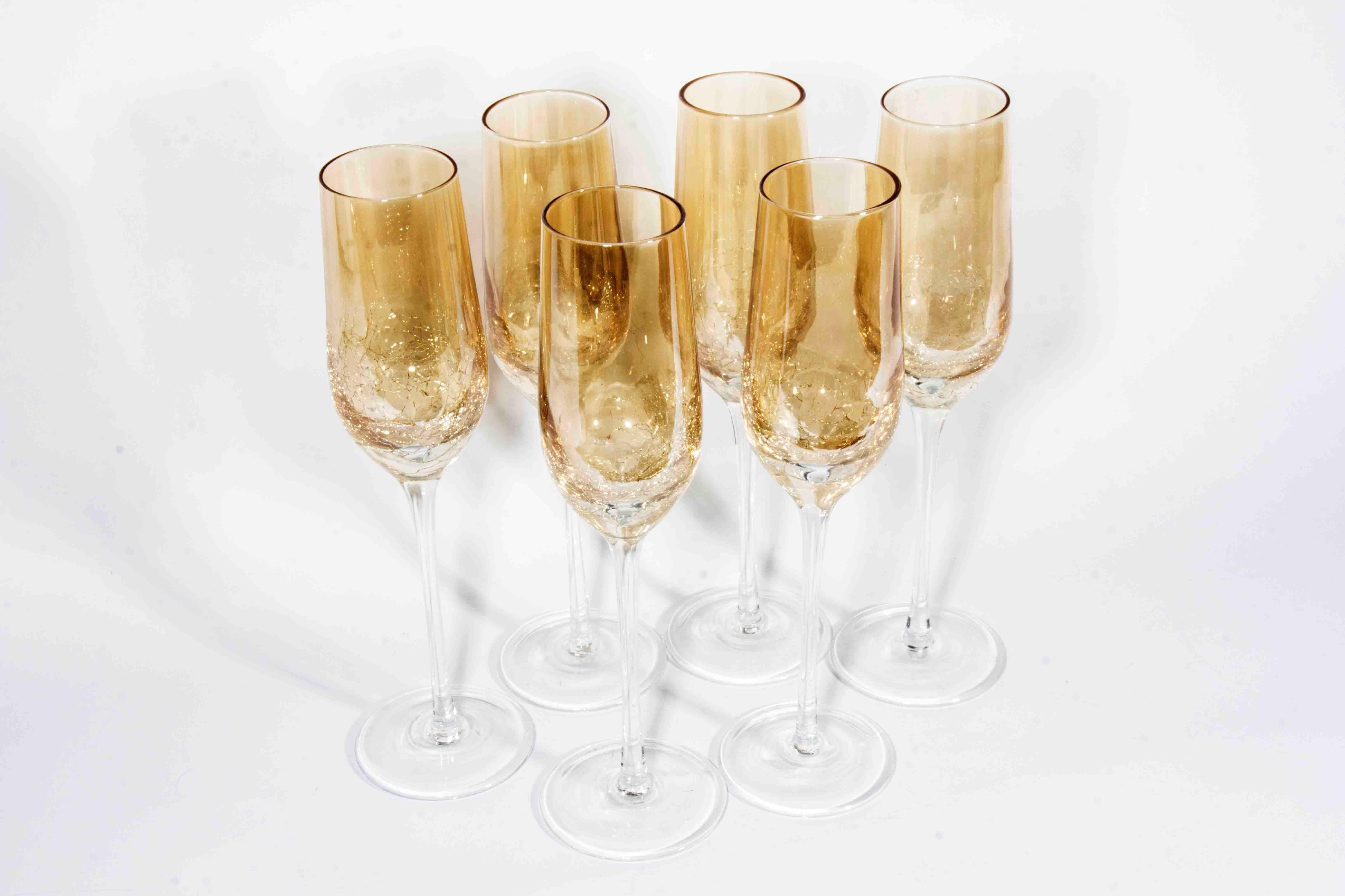  10 Vintage crystal crackled amber champagne flute. Excellent condition. Just beautiful. Each glass measure 10 inches high x 2 inches diameter.