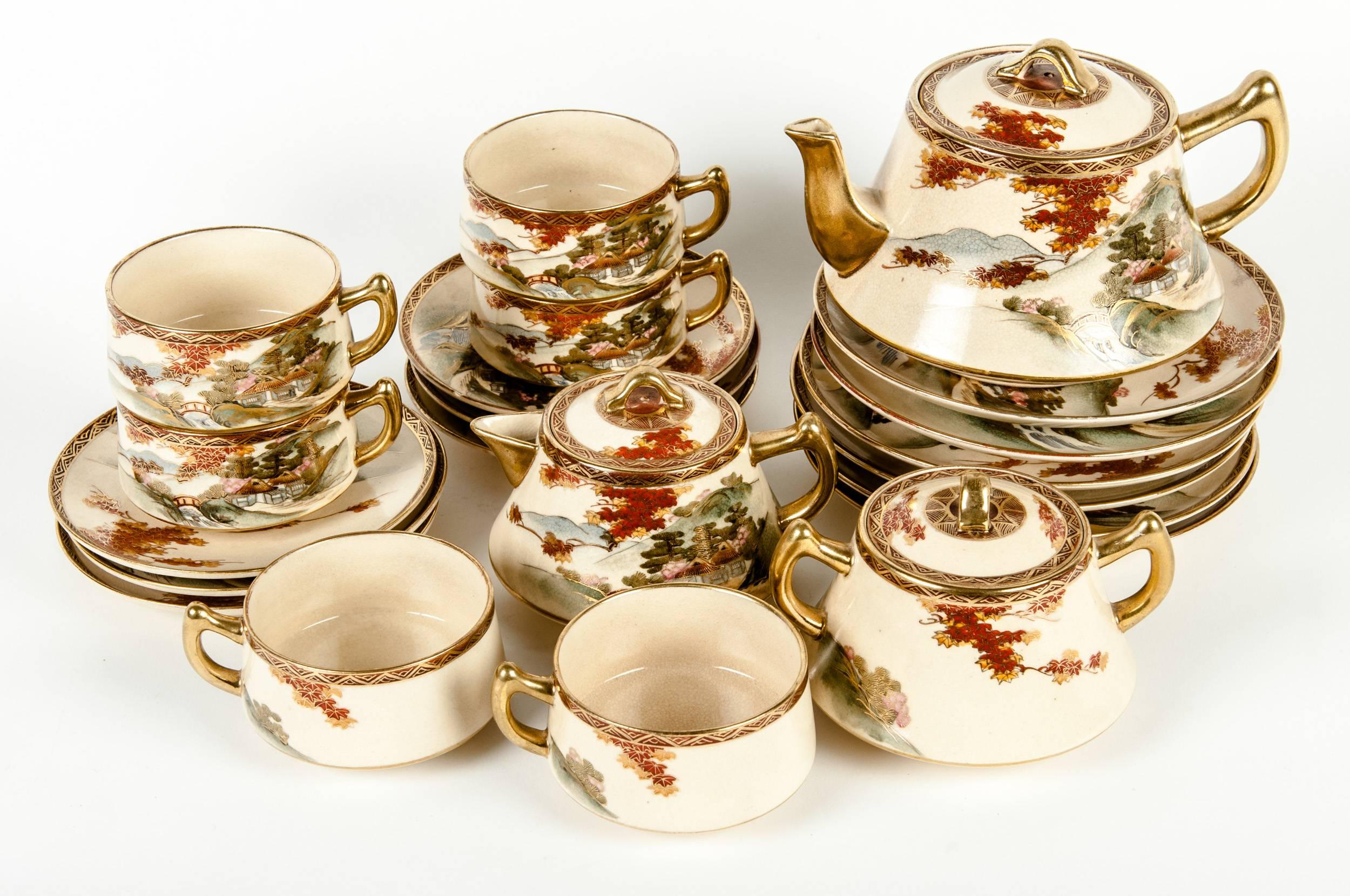 Vintage oriental tea service for six people. The tea pot measure 8 inches width x 4.5 inches high. The sugar bowl measure 5.5 inches width x 3 inches high. The creamer measure 6 inches width x 3 inches high.
