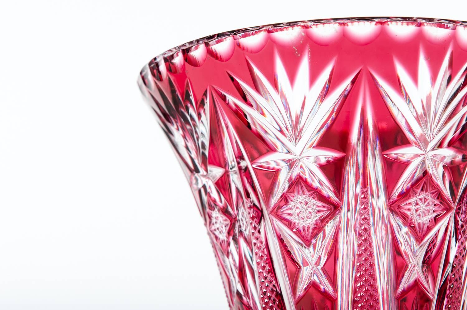 Vintage crystal cut cranberry vase. The vase stand 10 inches high x 6.5 inches top diameter.