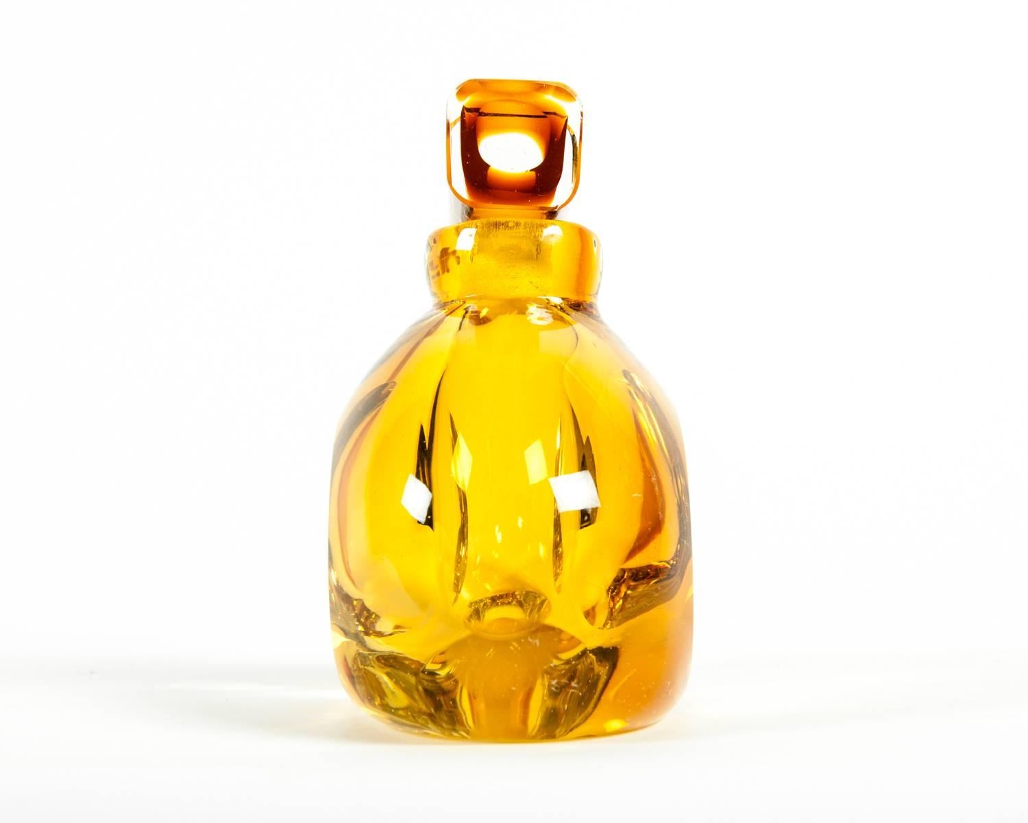 Vintage amber crystal decorative perfume bottle. Excellent condition. The perfume bottle measure 5.5 inches high x 3.5 x 5 inches width.
