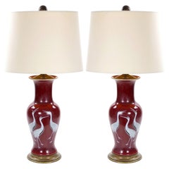 Pair of Mid-20th Century Burgundy Red Porcelain Chinoiserie Heron Table Lamps