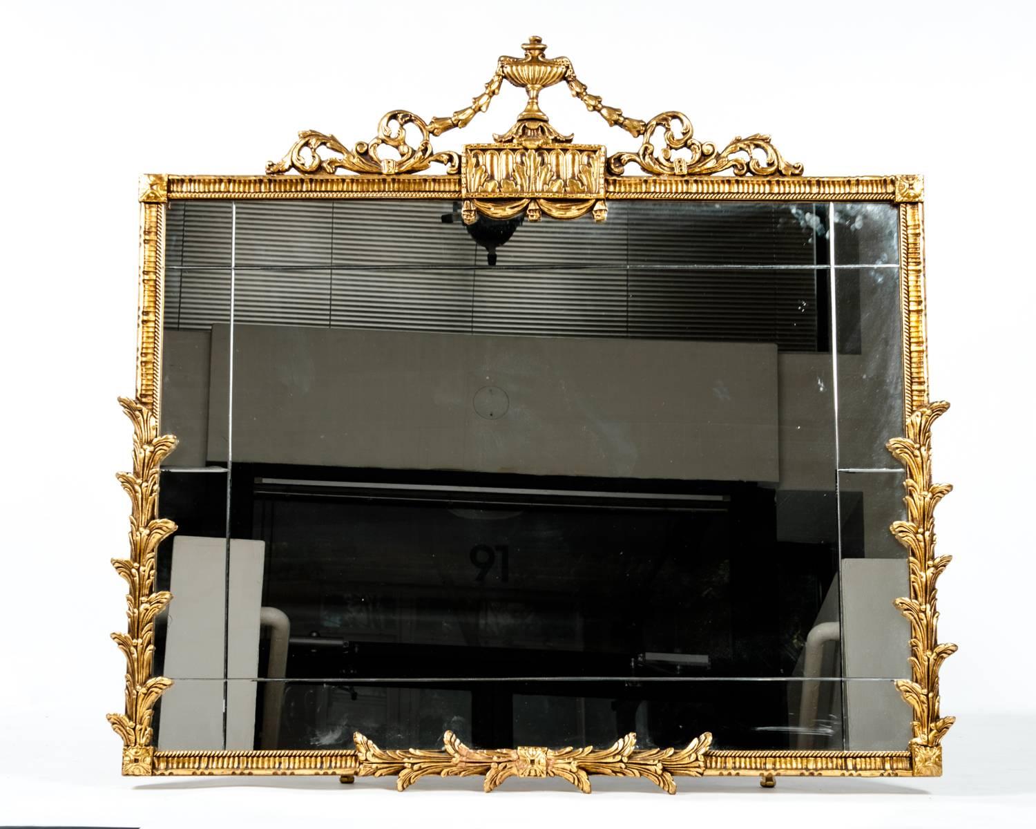Antique gilded wood frame hanging mantel / fireplace wall mirror. Excellent antique condition. The wall mirror measure 42 inches width x 40 inches high.