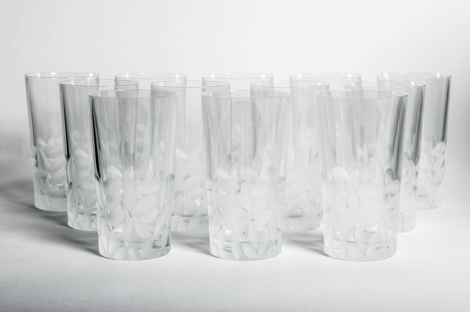 Mid-20th century high ball cut crystal Tiffany drinks glassware set of 12 pieces, in the Clover pattern. Excellent condition. Each high ball glass measure 6 inches high X 3.8 inches top diameter.