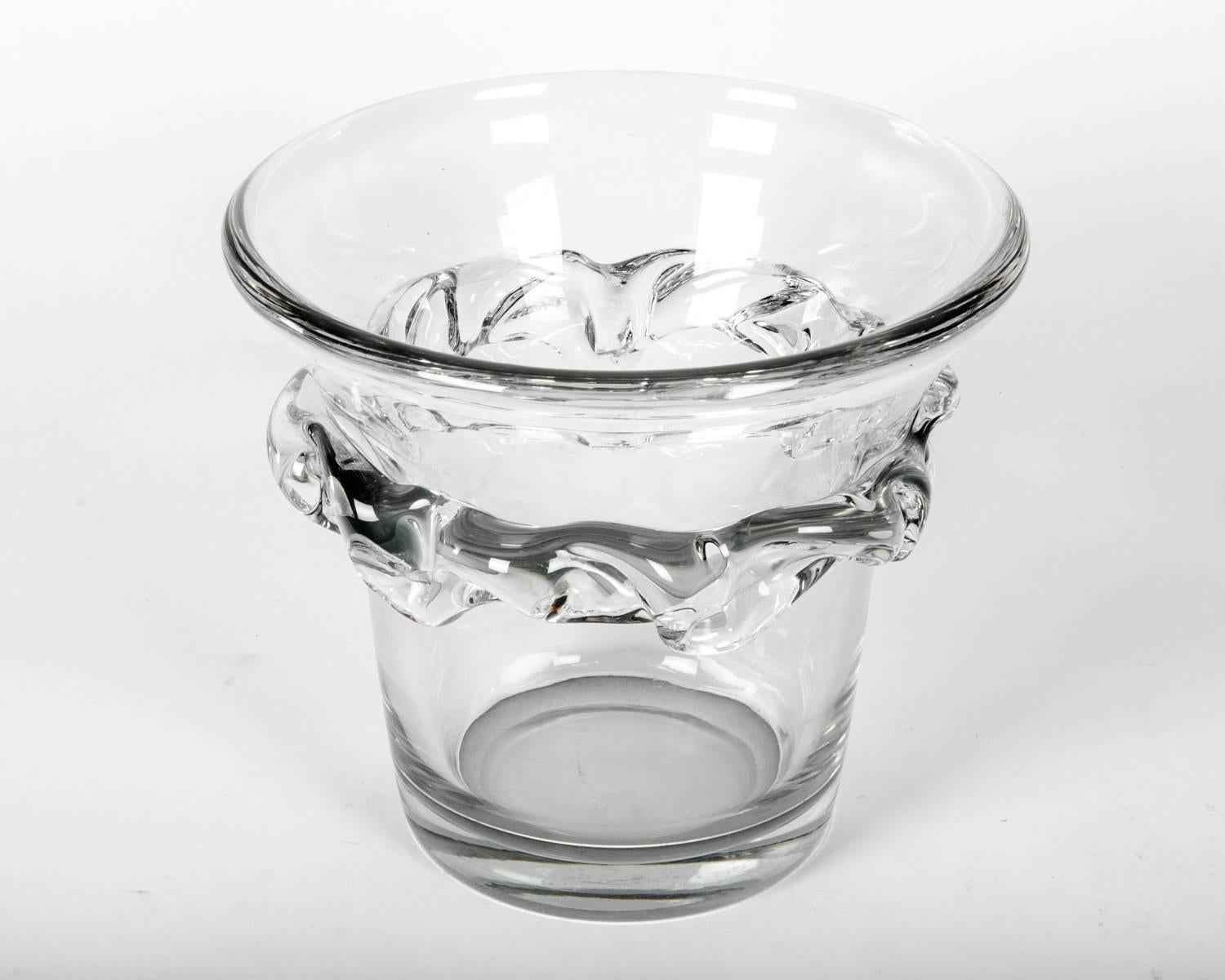 Large vintage ice bucket from the famed maker, Daum. Etched by Daum. Decorative crystal abstract element on the exterior. Measures: 9 inches tall and 10 inches wide.