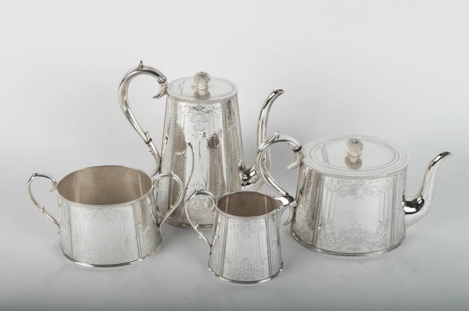 Old English silver plated tea or coffee service. Excellent condition. The tea pot measure 9 inches high x 8.5 inches diameter. The coffee pot measure 6 inches high x 9.5 inches diameter. The sugar dispenser 8 inches diameter x 4.5 inches high. The