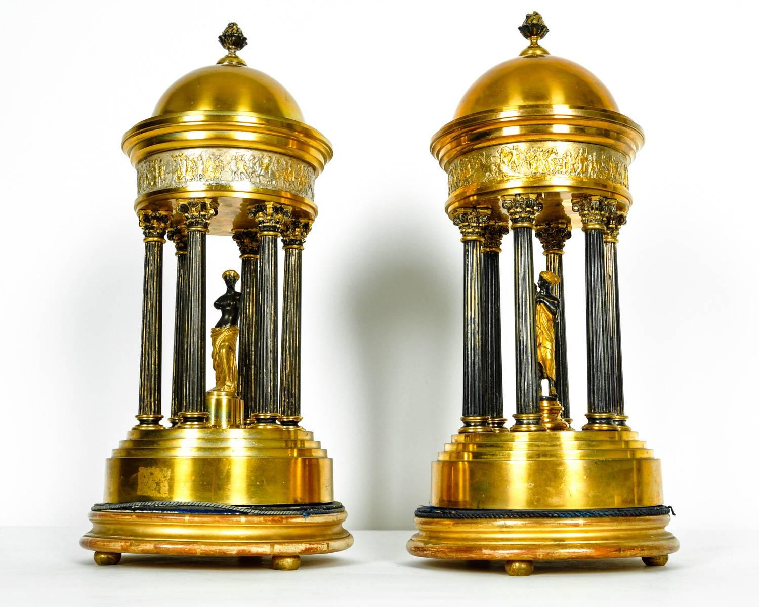 A very impressive pair of antique French bronze Greek dome with goddess sculpture. In excellent antique condition. Each piece measure 16 inches tall x 7.5 inches diameter.