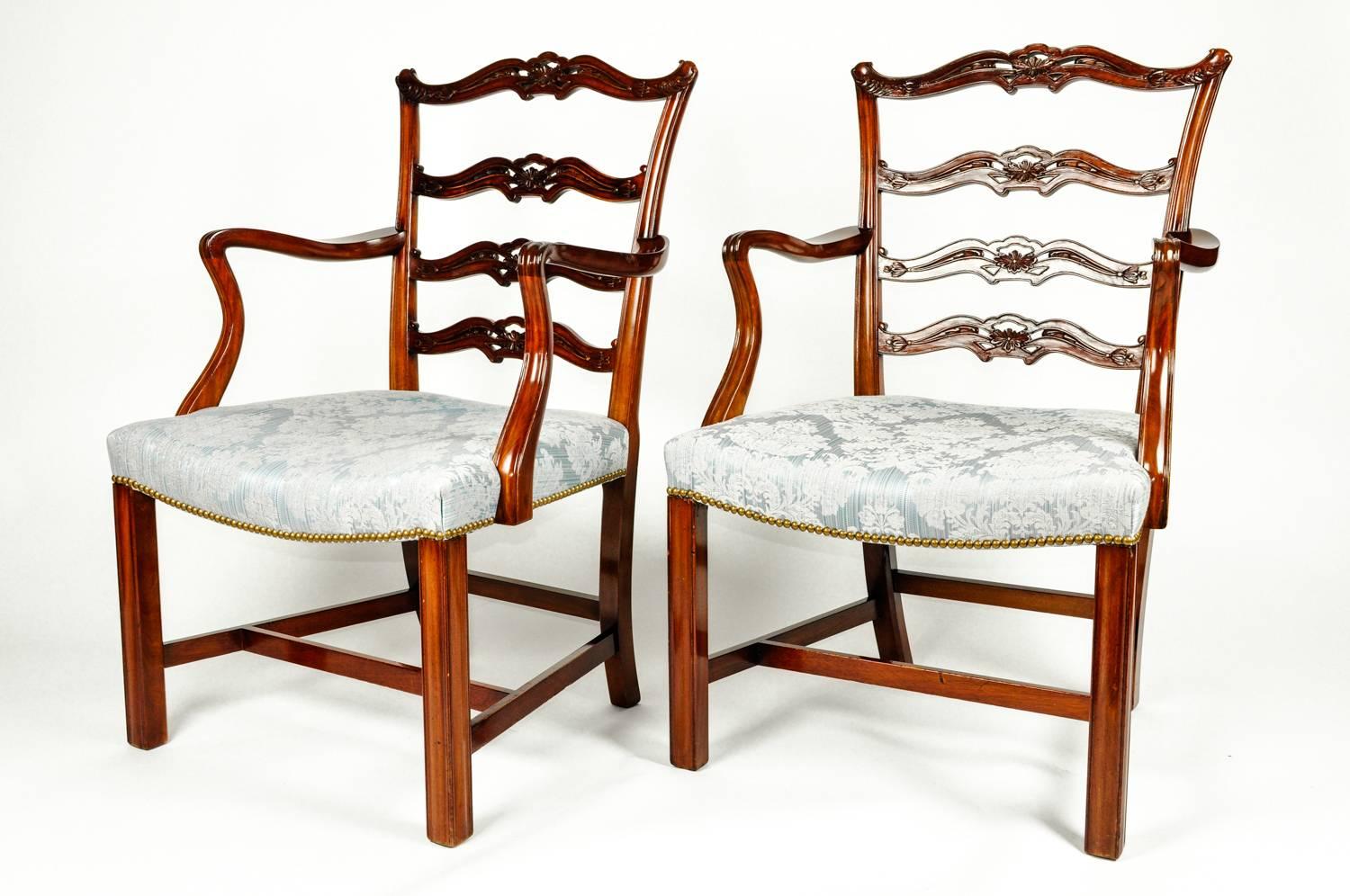 Antique pair of English carved ribbon back chairs with gray damask upholstery. Each chair measure 39 inches high x 24 inches width seat High 16 inches. Chairs are in excellent condition. Recently reupholstered.