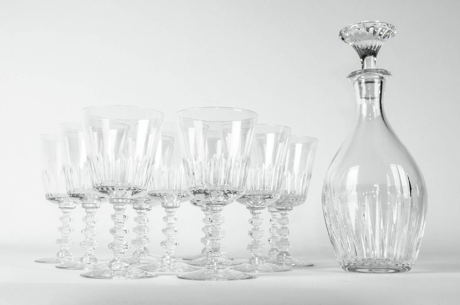 Vintage France acid etched Baccarat decanter set with 12 glassware. Each piece is in excellent condition, maker's mark undersigned. The Baccarat decanter measure about 11 inches high x 4.5 inches diameter. Each glass measure 6.2 inches high x 3.5