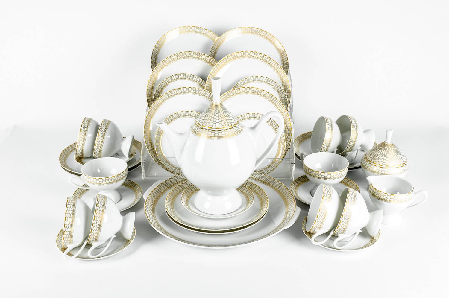 Exquisitely beautiful Art Deco German Porcelain Luncheon tea or coffee service for ten people. Every piece is in excellent vintage condition. The set include large round tray. Tea or coffee pot. One covered sugar container. One milk or creamer