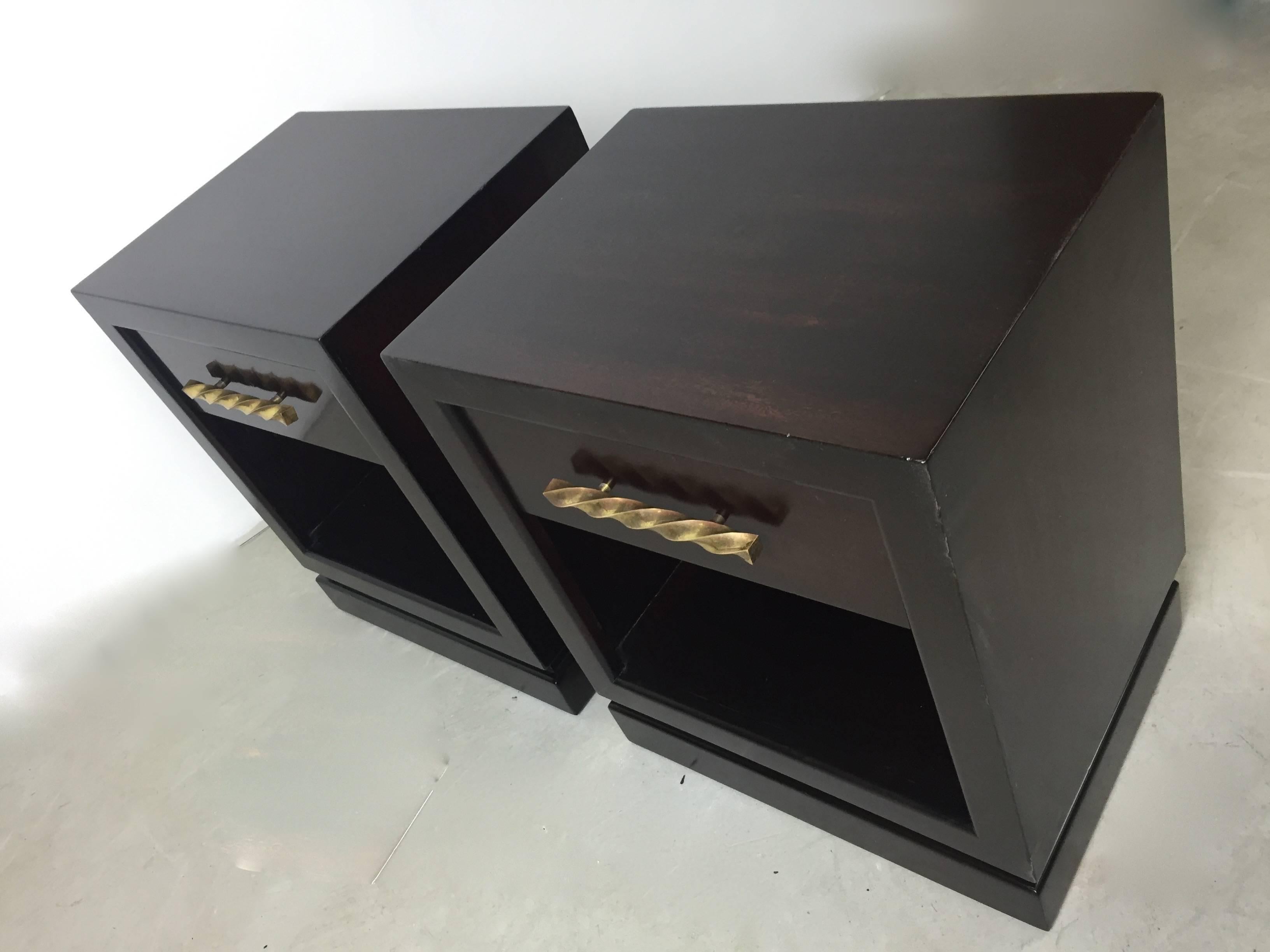 Pair of custom-made 1950s lamp tables in Mahogany with handmade brass hardware. Matching chests are available as well. A great American modern design.