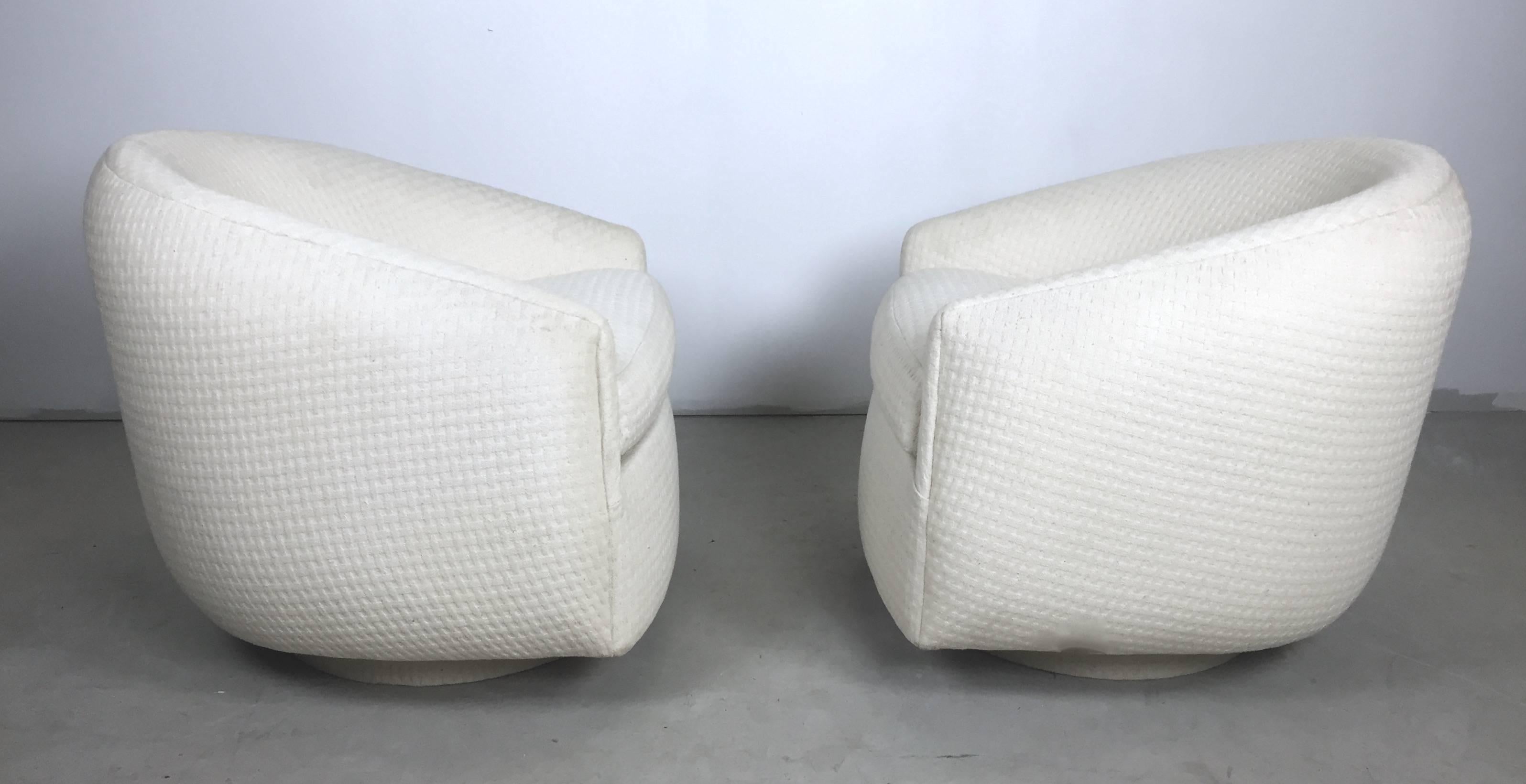 This is a Lovely Pair of Milo Baughman Swivel base Tub Chairs. In a Period Basket Weave Wool that has been professionally cleaned.