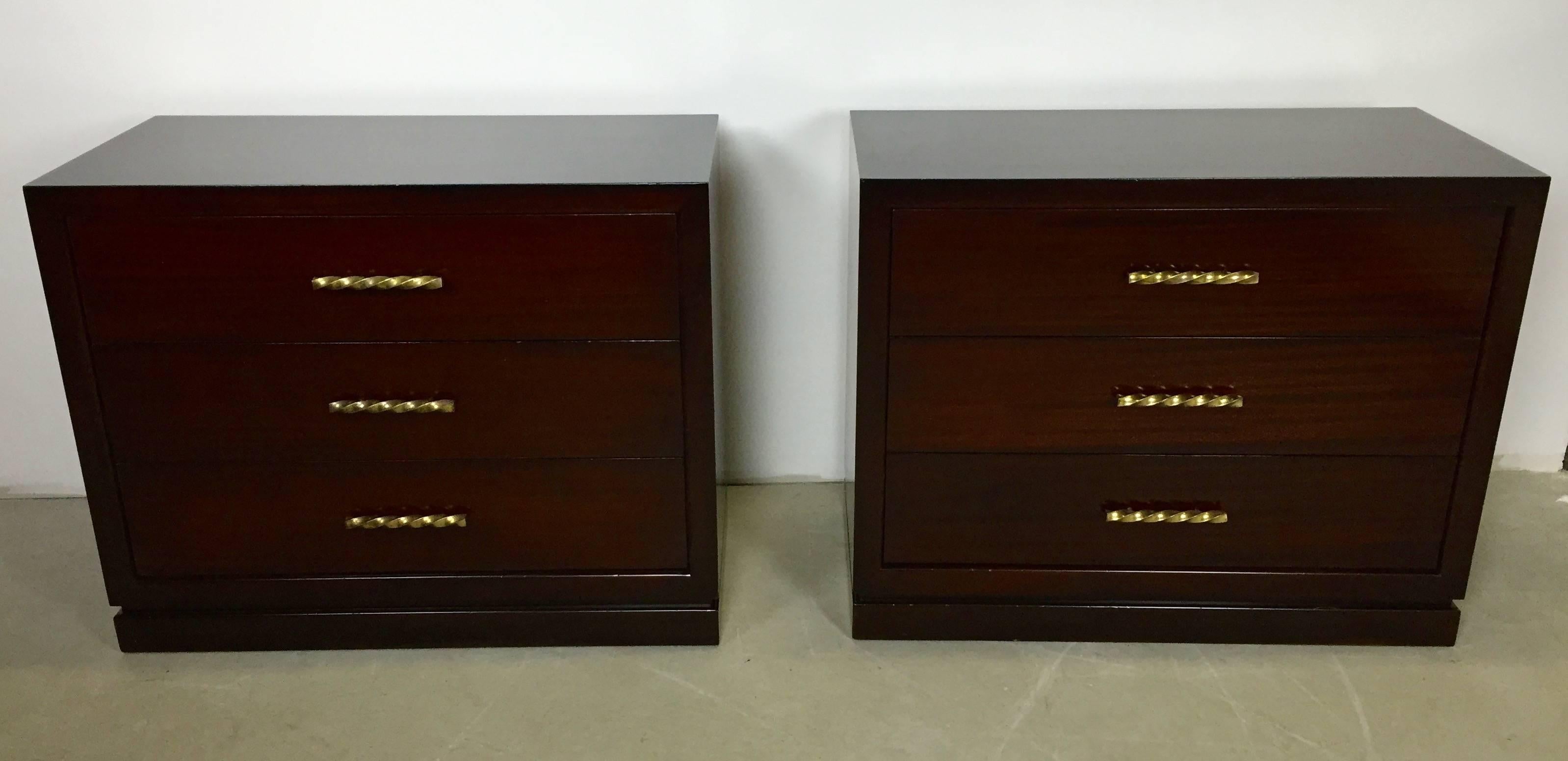 Pair of custom-made 1950s chests in mahogany with handmade brass hardware. Matching lamp tables are available as well. A great American modern design.