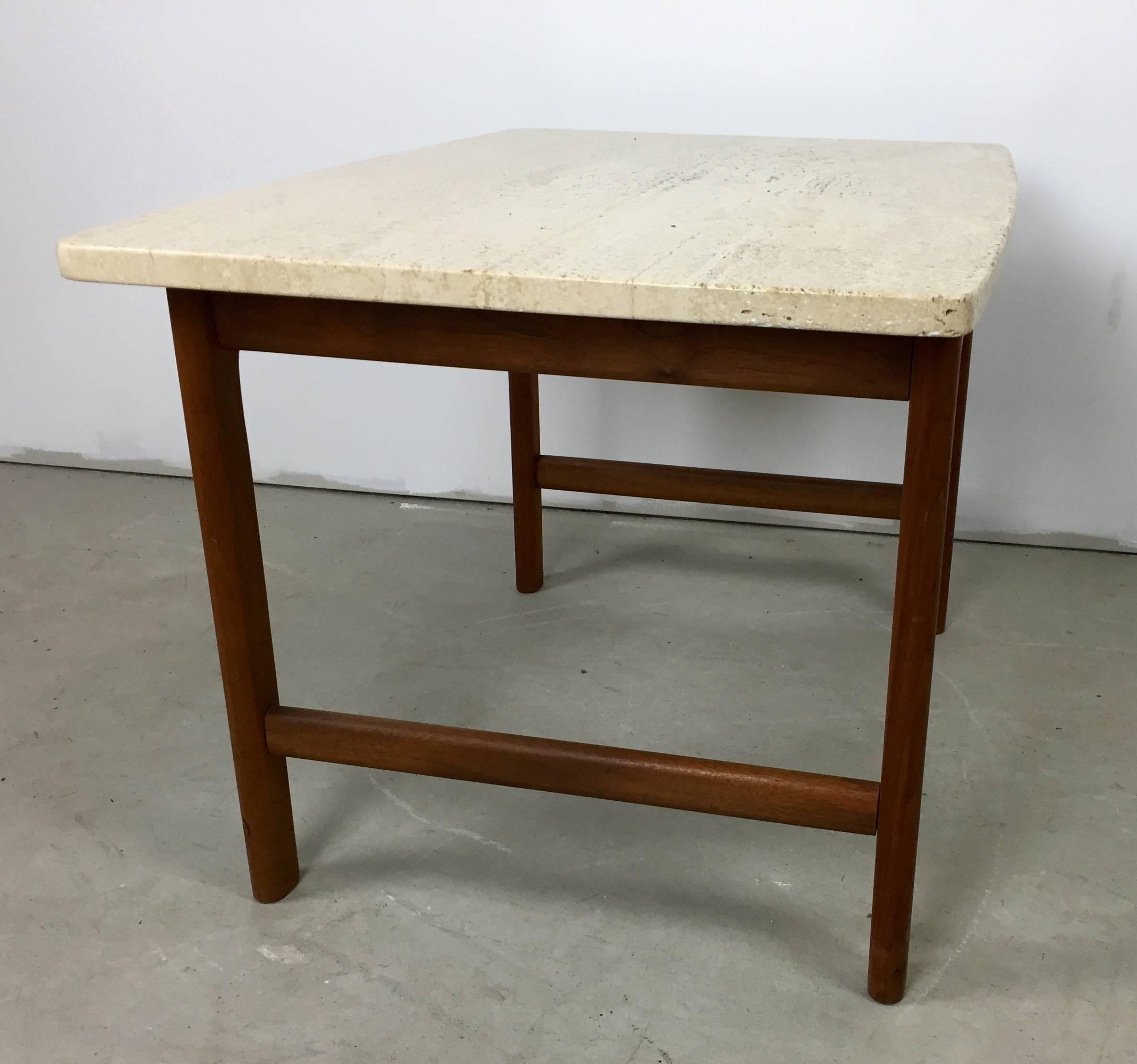 A solid teak lamp table with a travertine marble-top designed by Folke Ohlsson for DUX. In excellent condition and with elegant proportions.