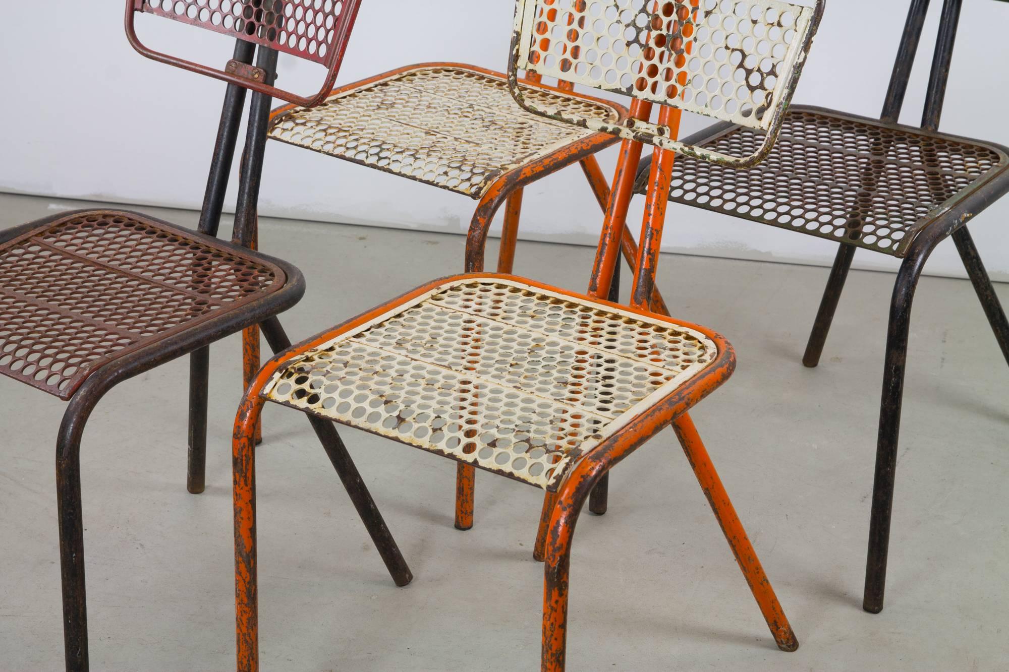 A rare set of four 'Radar' chairs designed by Rene Malaval for Bloc Metal. These perfect post-war French tubular steel chairs incorporate surplus materials from WWII cartridge belts and feature lightweight mesh backrests and seats.
