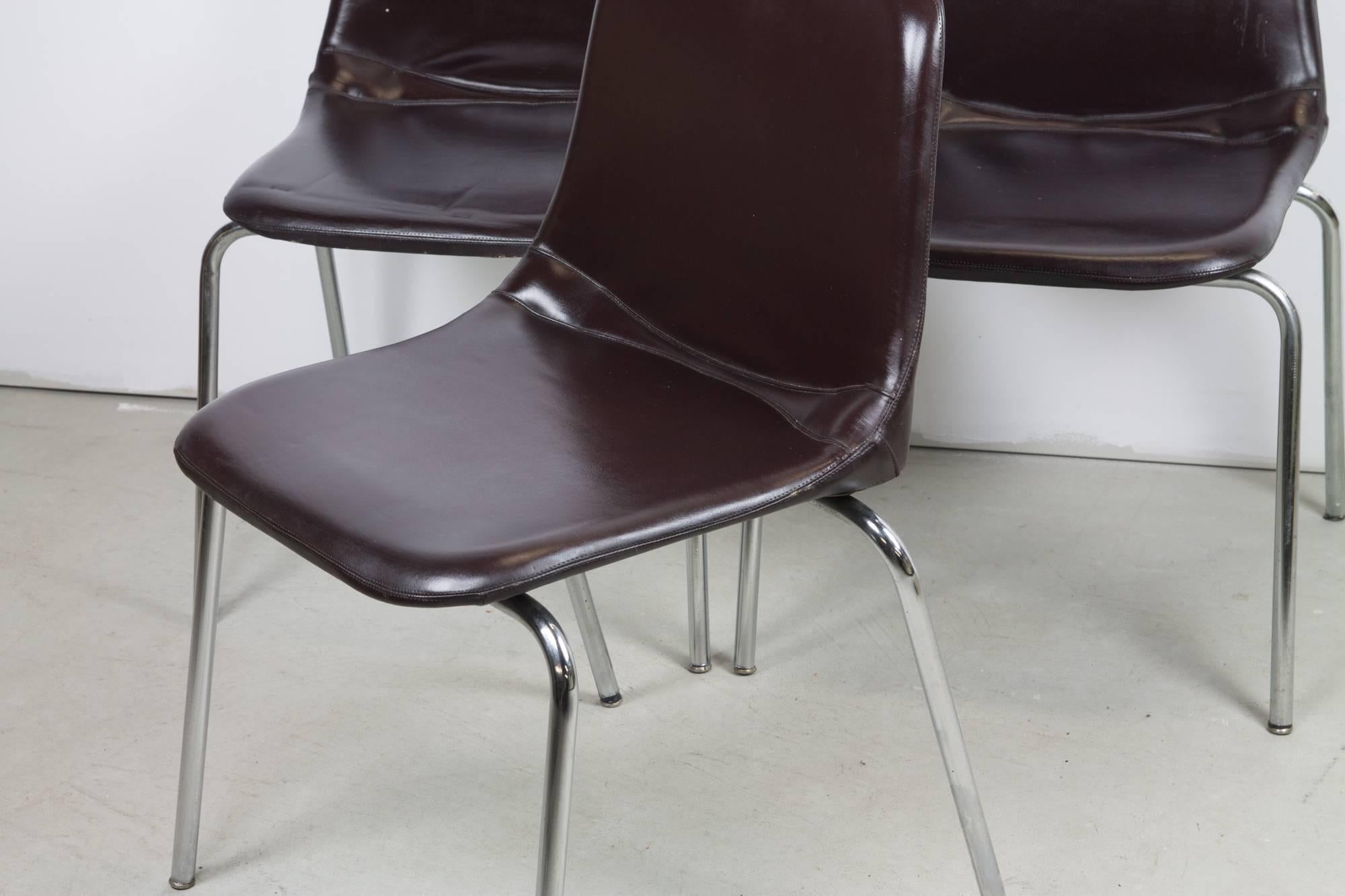 Three simple side chairs by Ico Parisi for MIM Mobili with thin tubular steel legs and naugahyde upholstery.